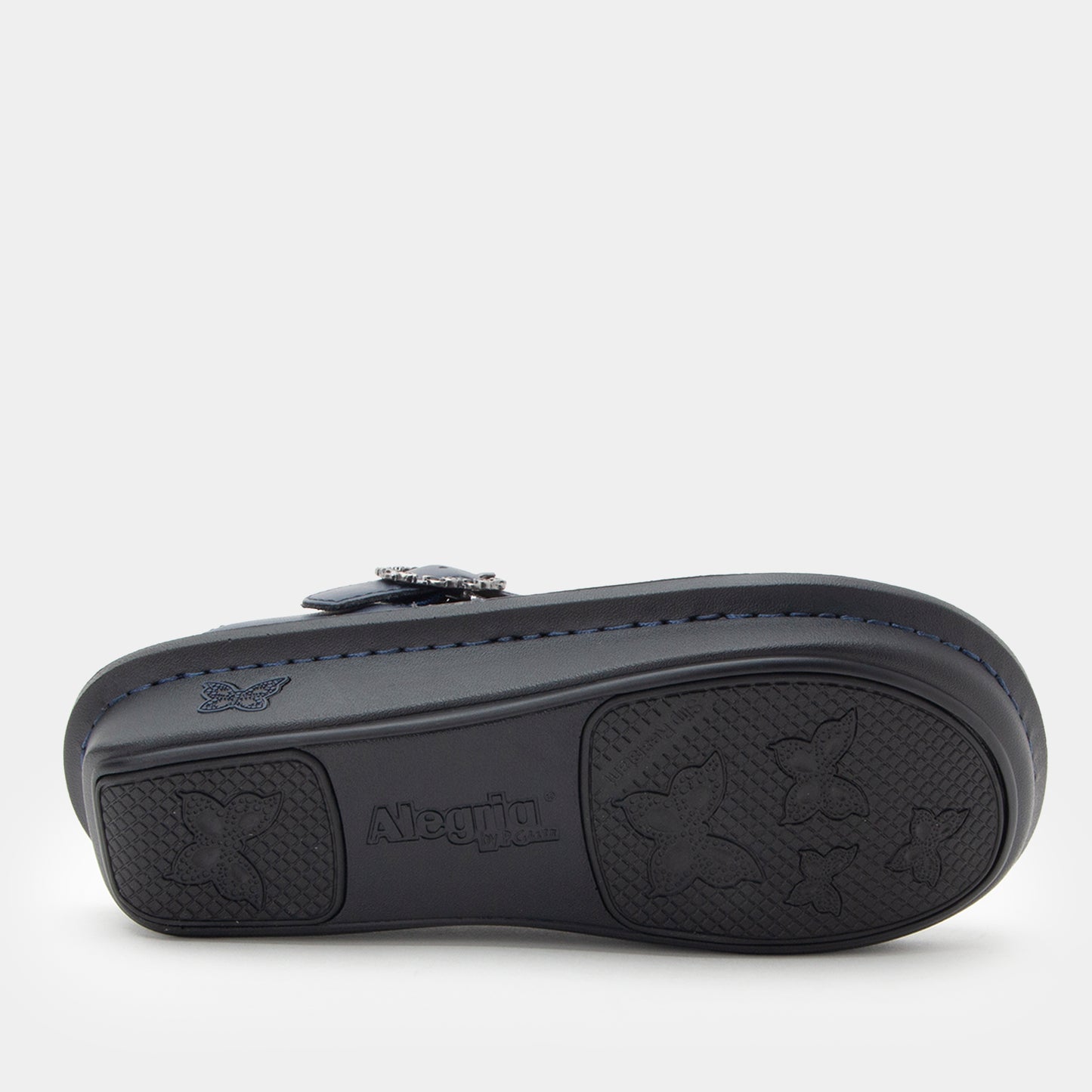 Black clog with a visible brand logo on a white background