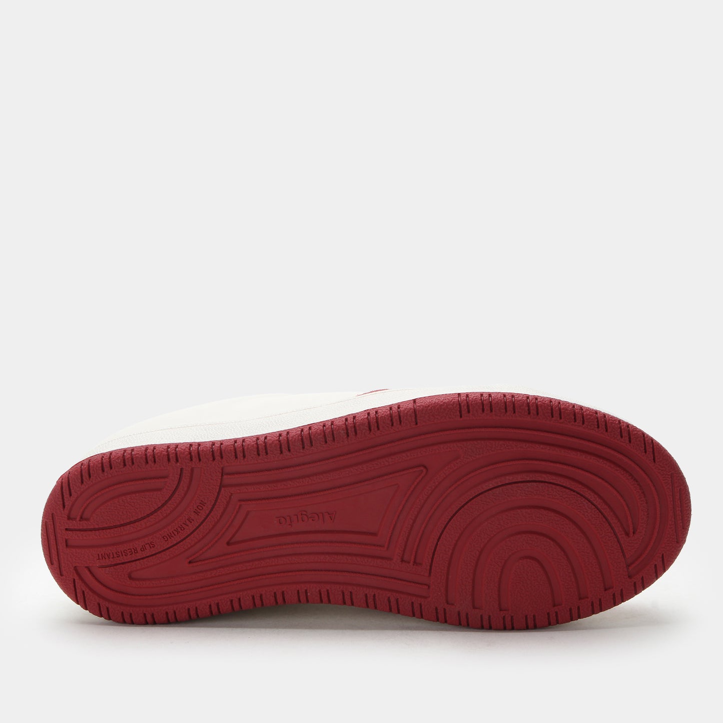 Red sole of a shoe on a white background