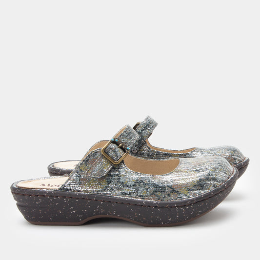 Silver glittery sandal with a strap on a white background