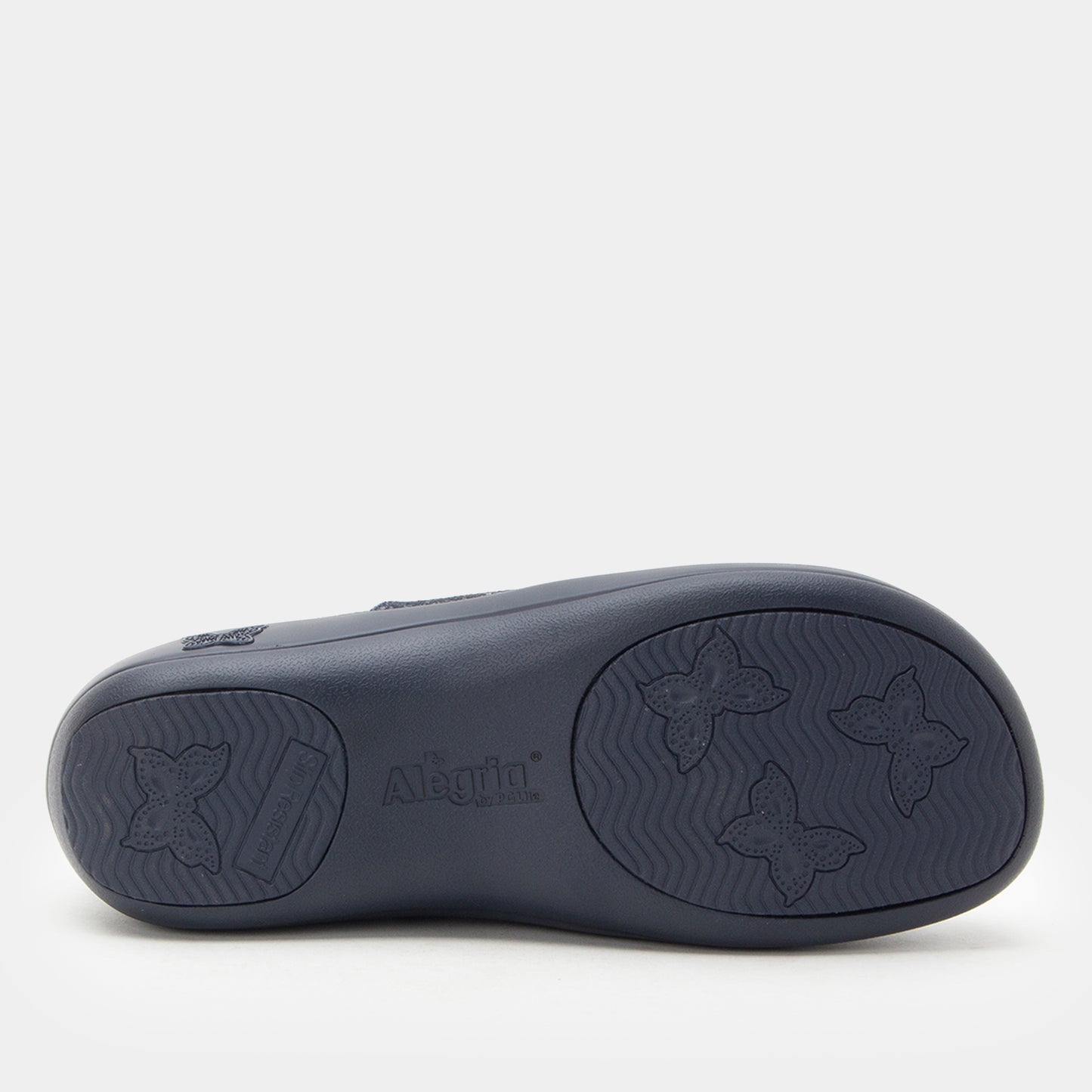 Black rubber slide sandal sole on a white background