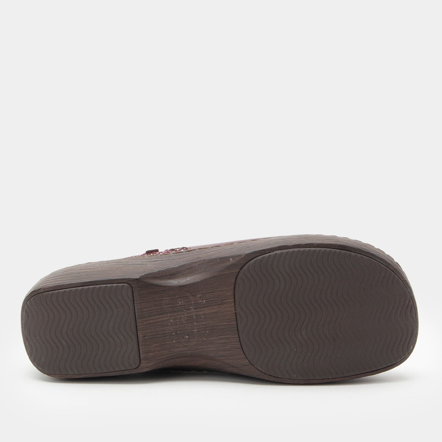 Brown shoe sole on a white background