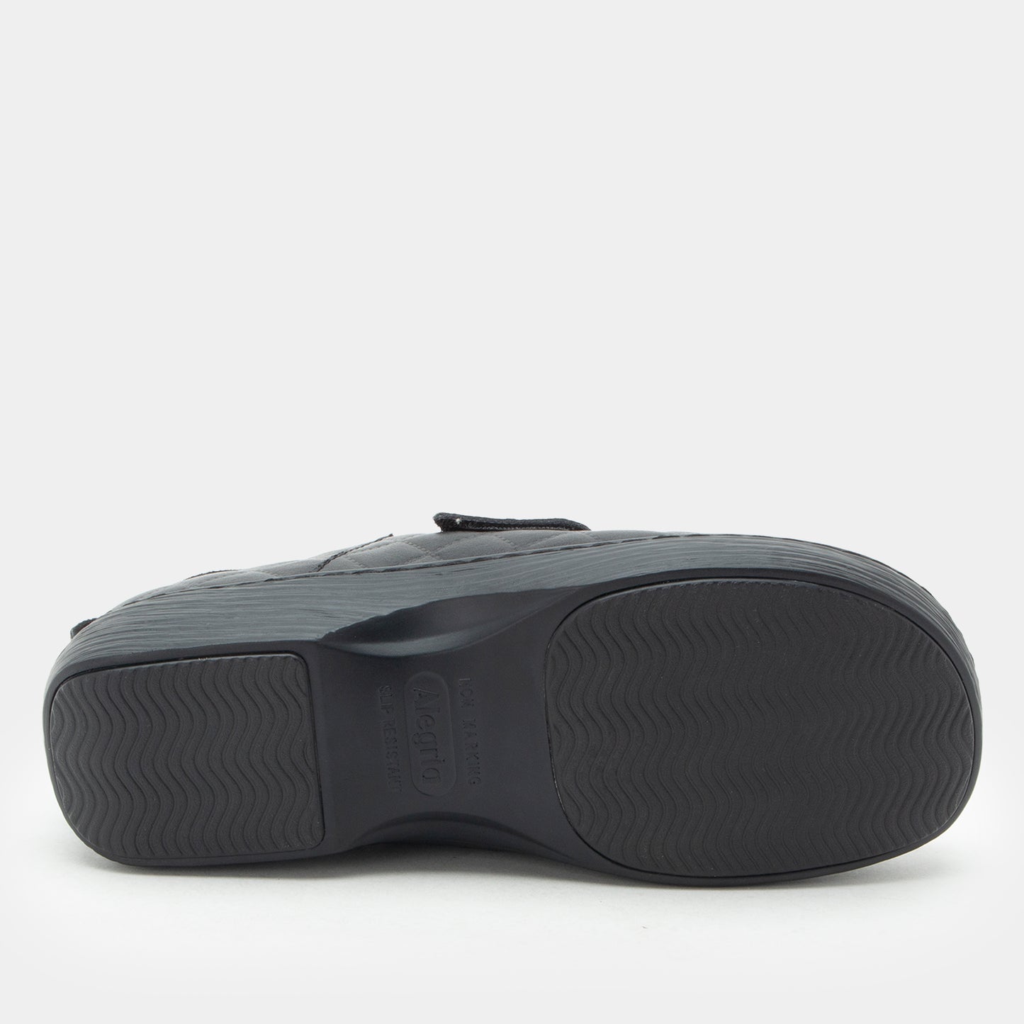 Black sandal with a strap on a white background