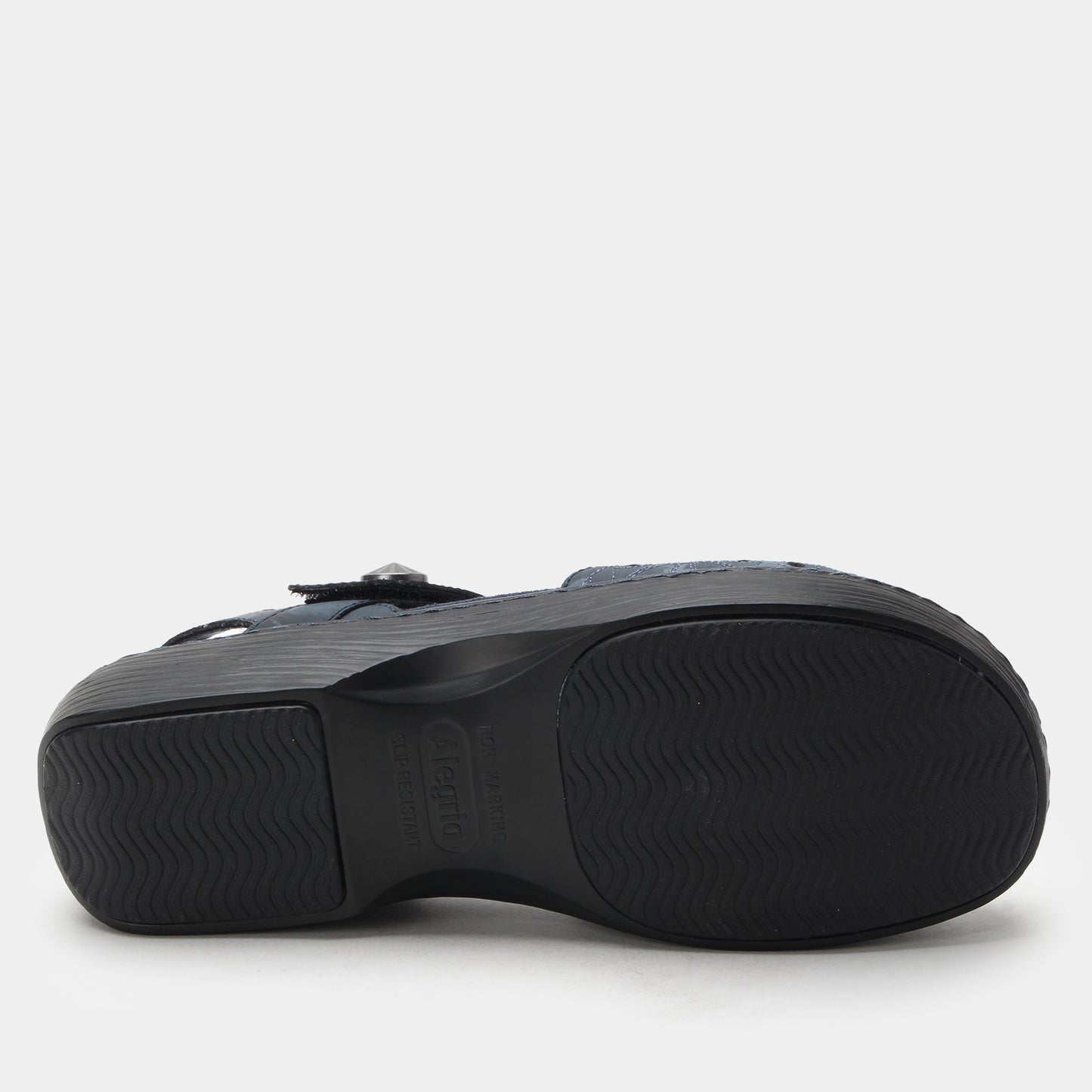 Black sandal with a textured sole on a white background