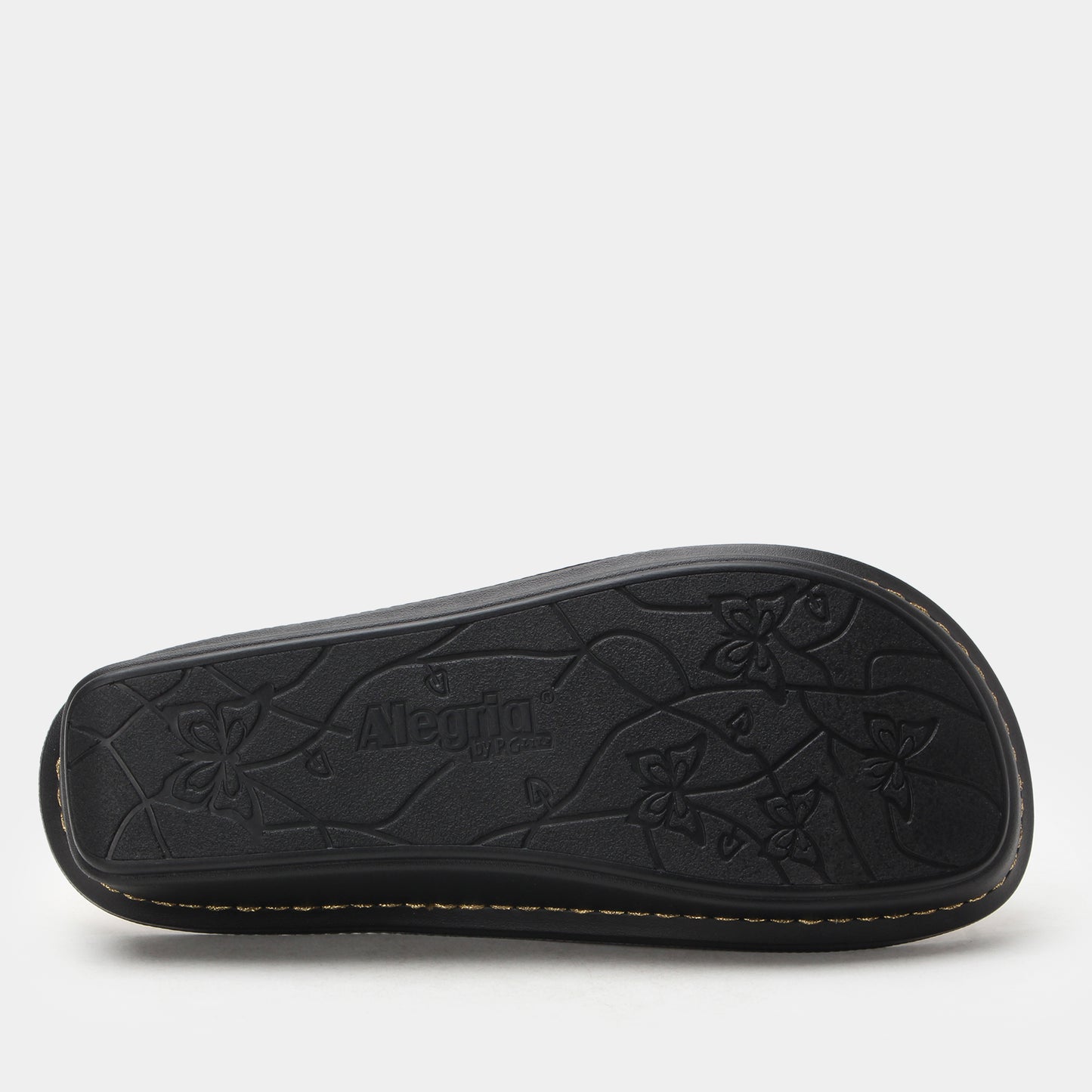Black sandal sole with floral patterns and 'Alpina' branding on a white background