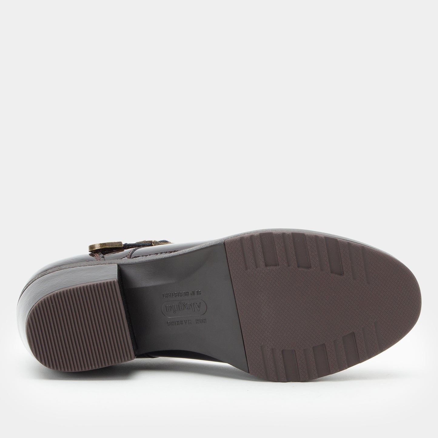 A close-up shot of the outsole of a dark brown leather Mary Jane showing the tread pattern and the brand name 'Alegria' printed on the heel.