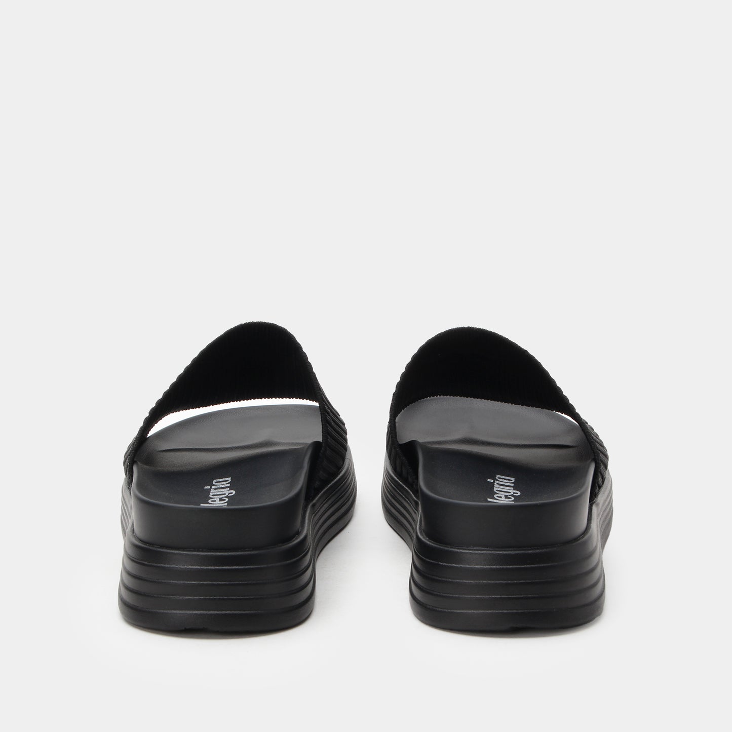 Black sandals with a brand logo on a white background
