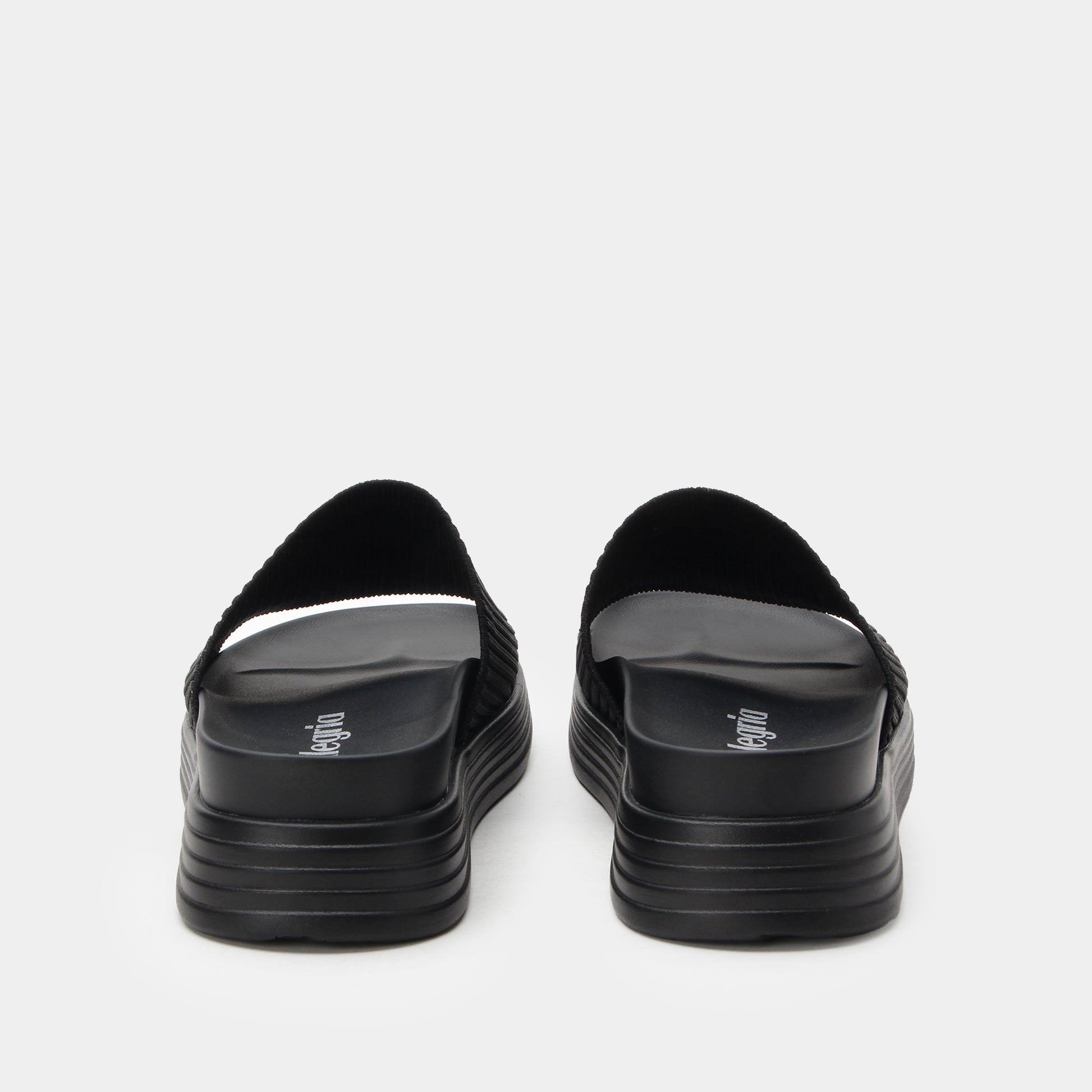 Black sandals with a brand logo on a white background