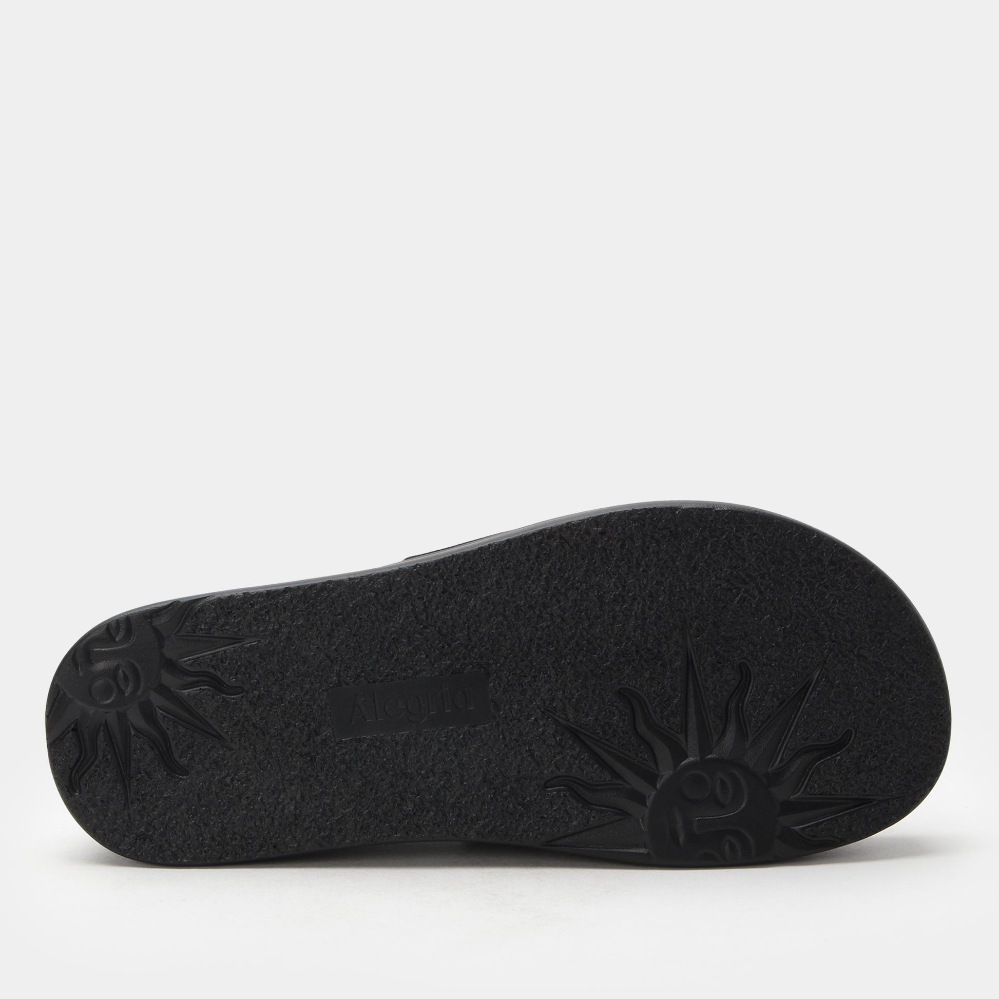 Black sandal sole on a light gray background