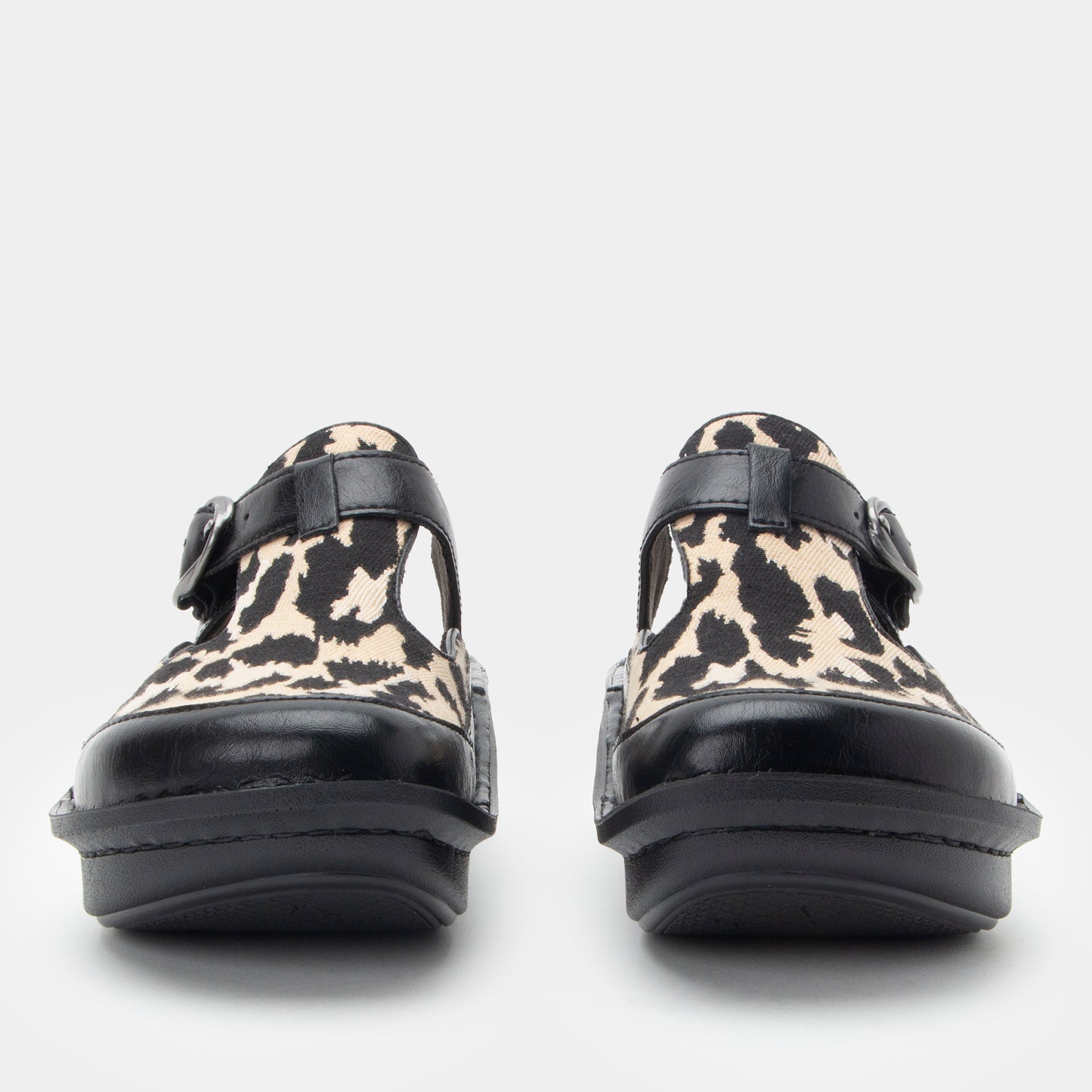 Pair of leopard print clogs with black straps on a light gray background