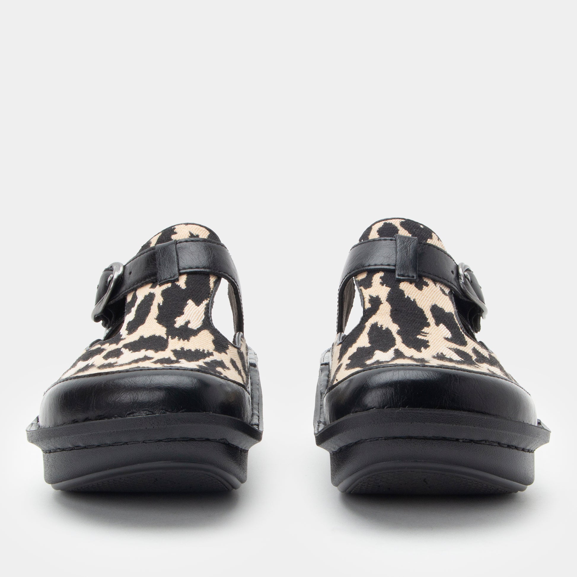 Pair of leopard print clogs with black straps on a light gray background