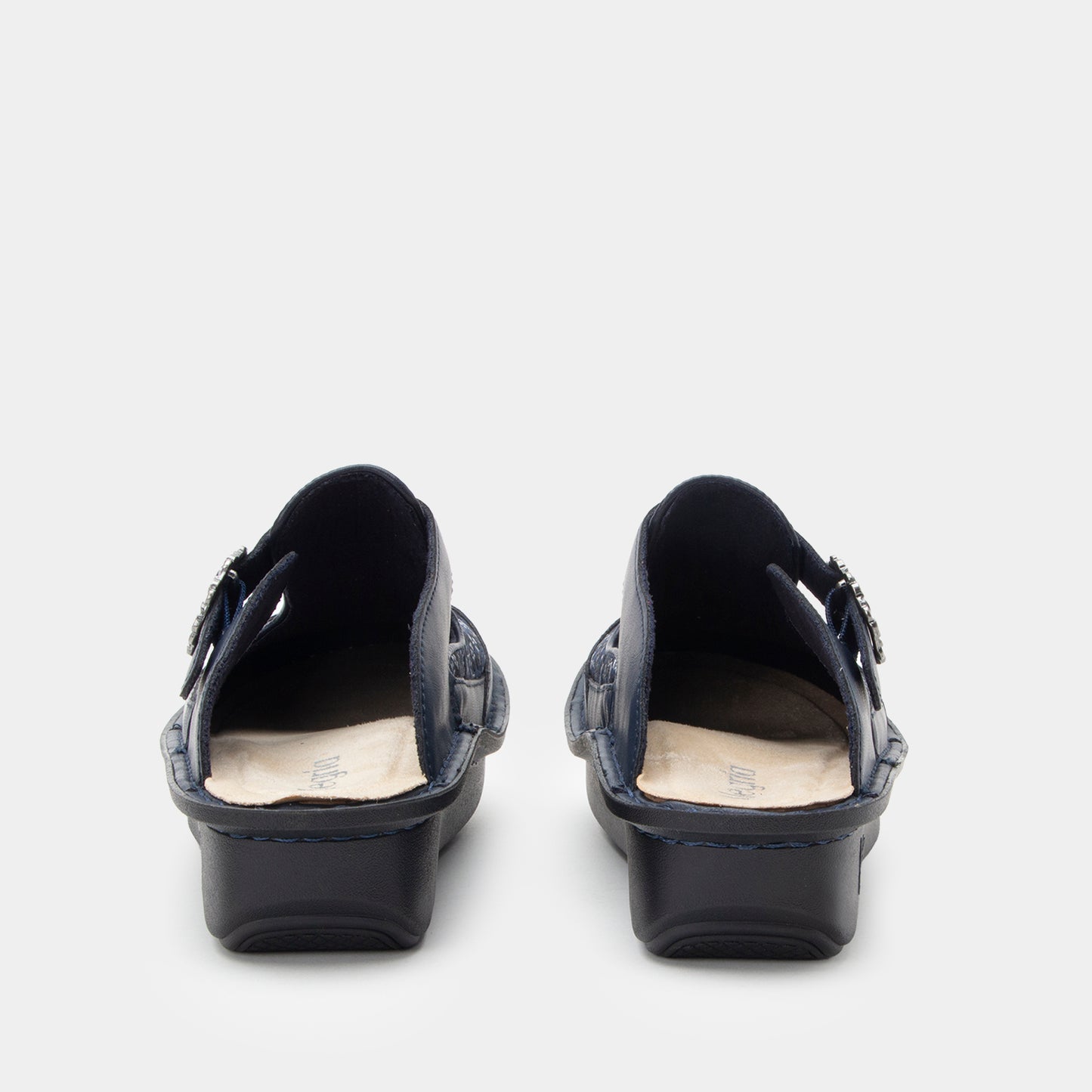 Pair of navy shoes on a white background