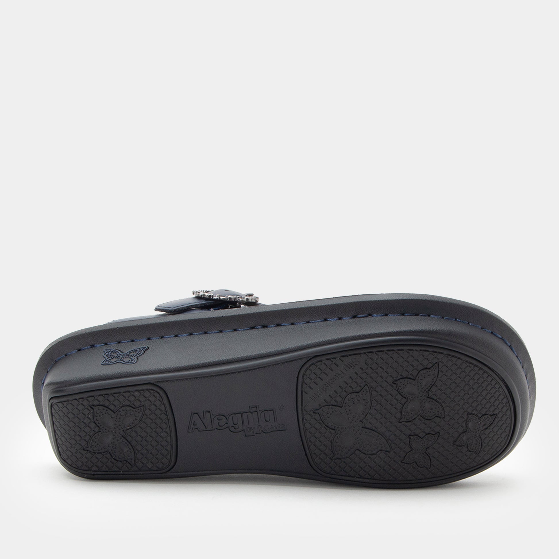 Black clog with a visible brand logo on a white background