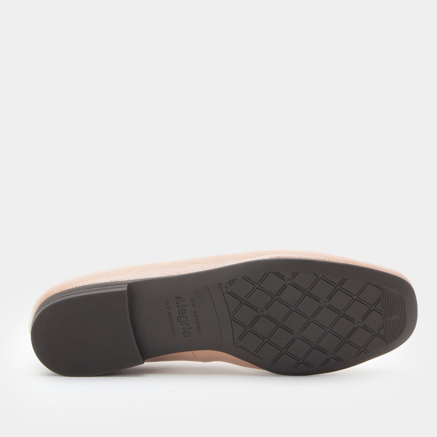 Shoe sole with tread pattern on a white background