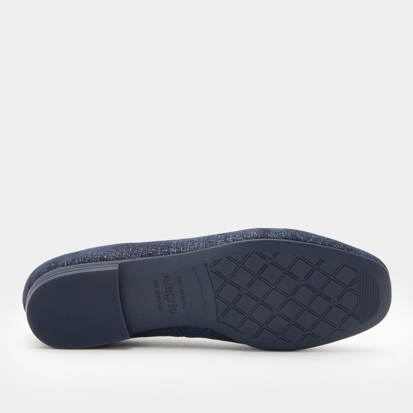 Close-up of a shoe sole with brand name on a white background