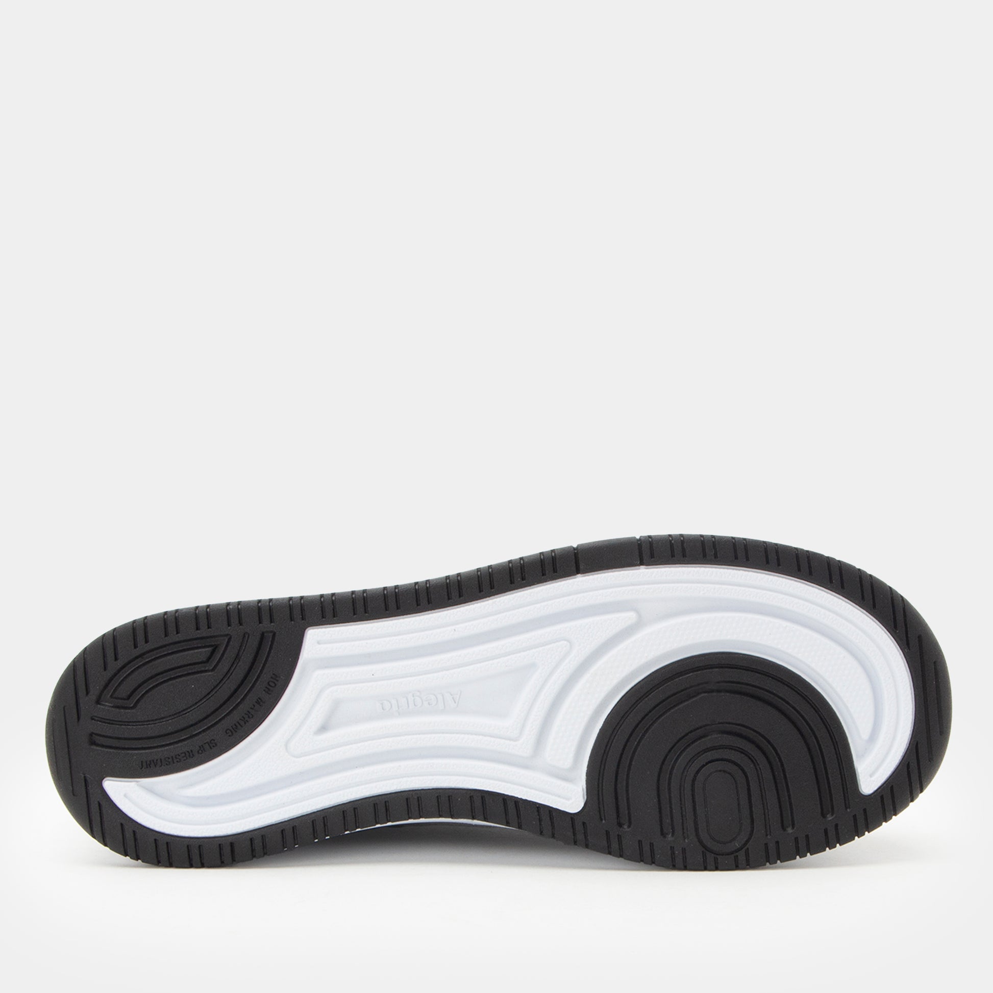 Black and white sneaker sole on a light gray background