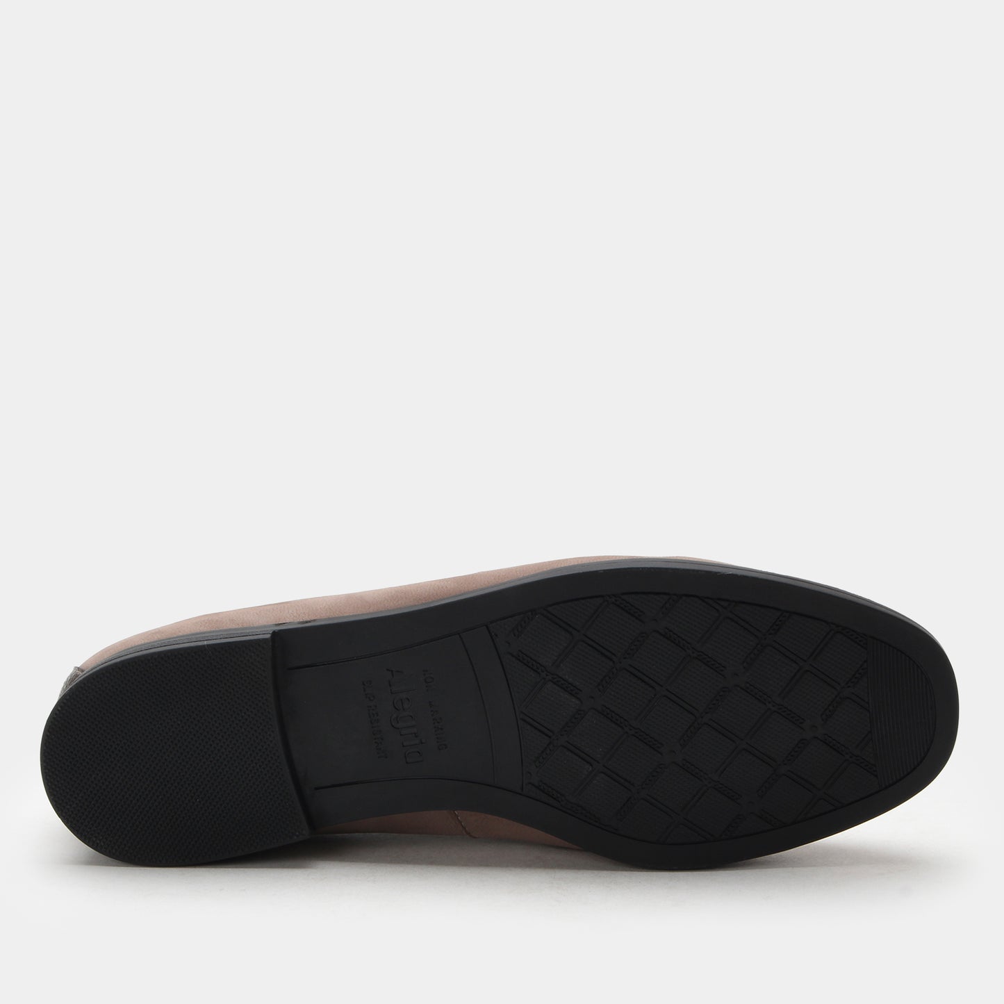 Brown shoe sole with a textured pattern on a white background