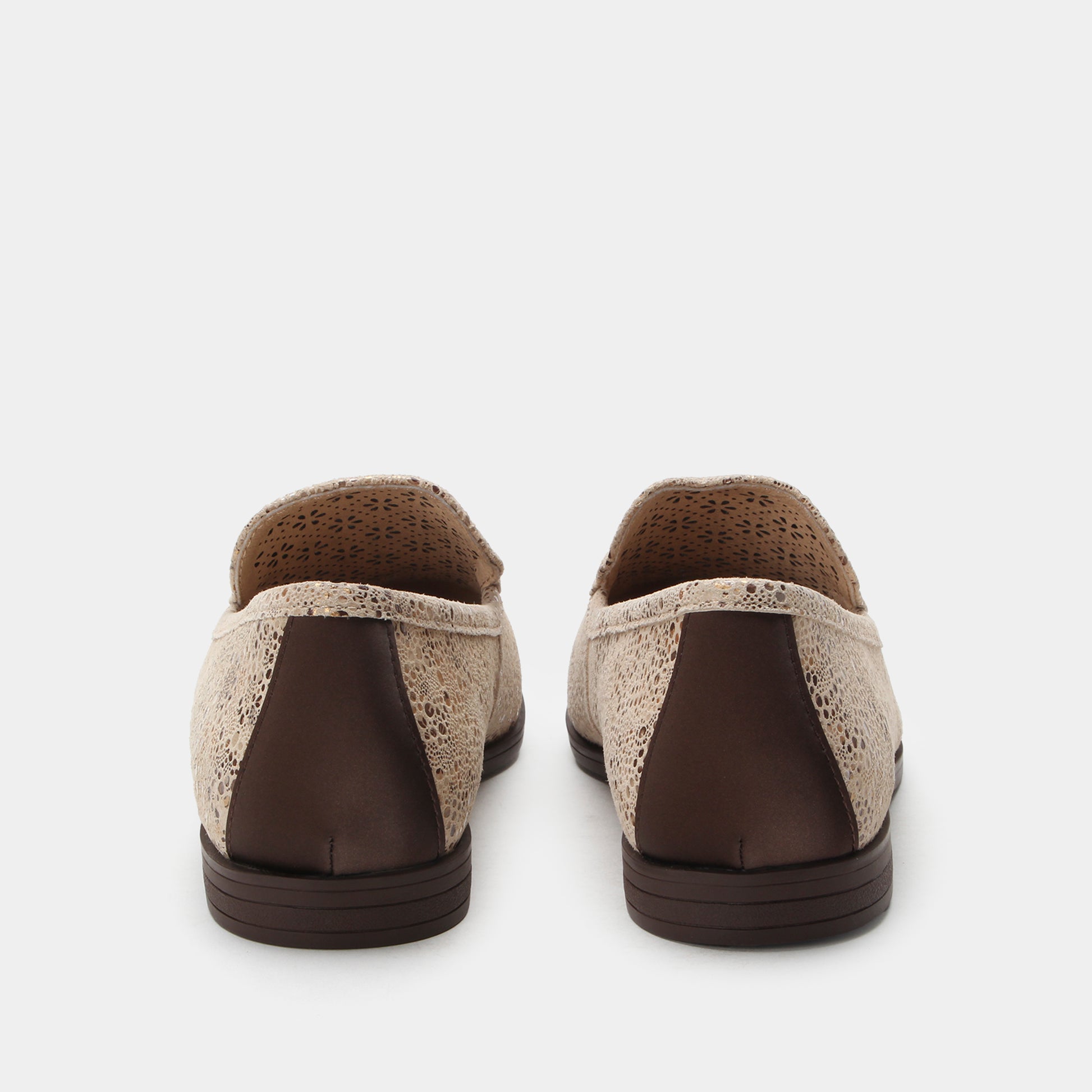Pair of brown and beige shoes on a white background