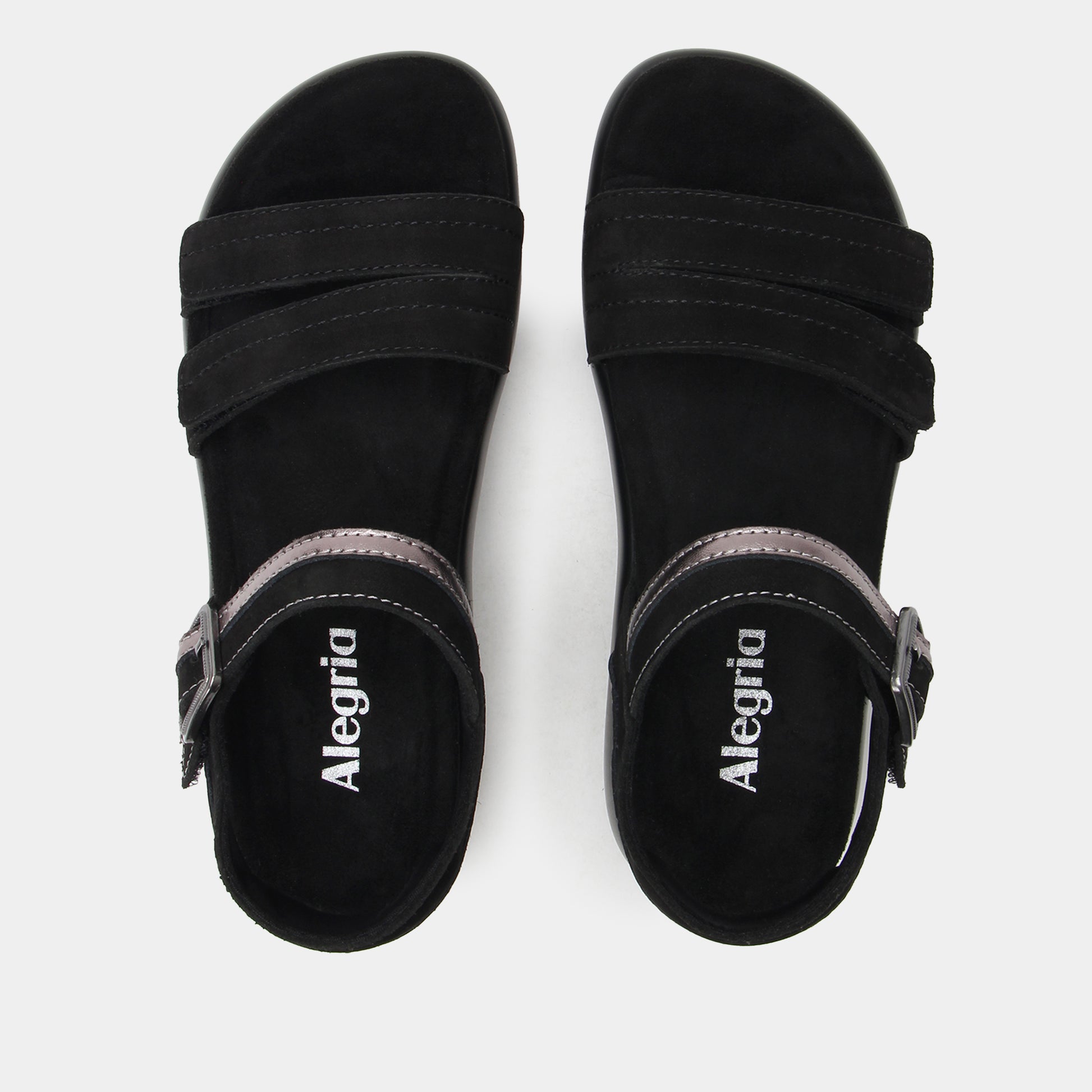 Black sandals with 'Alegria' branding on a white background