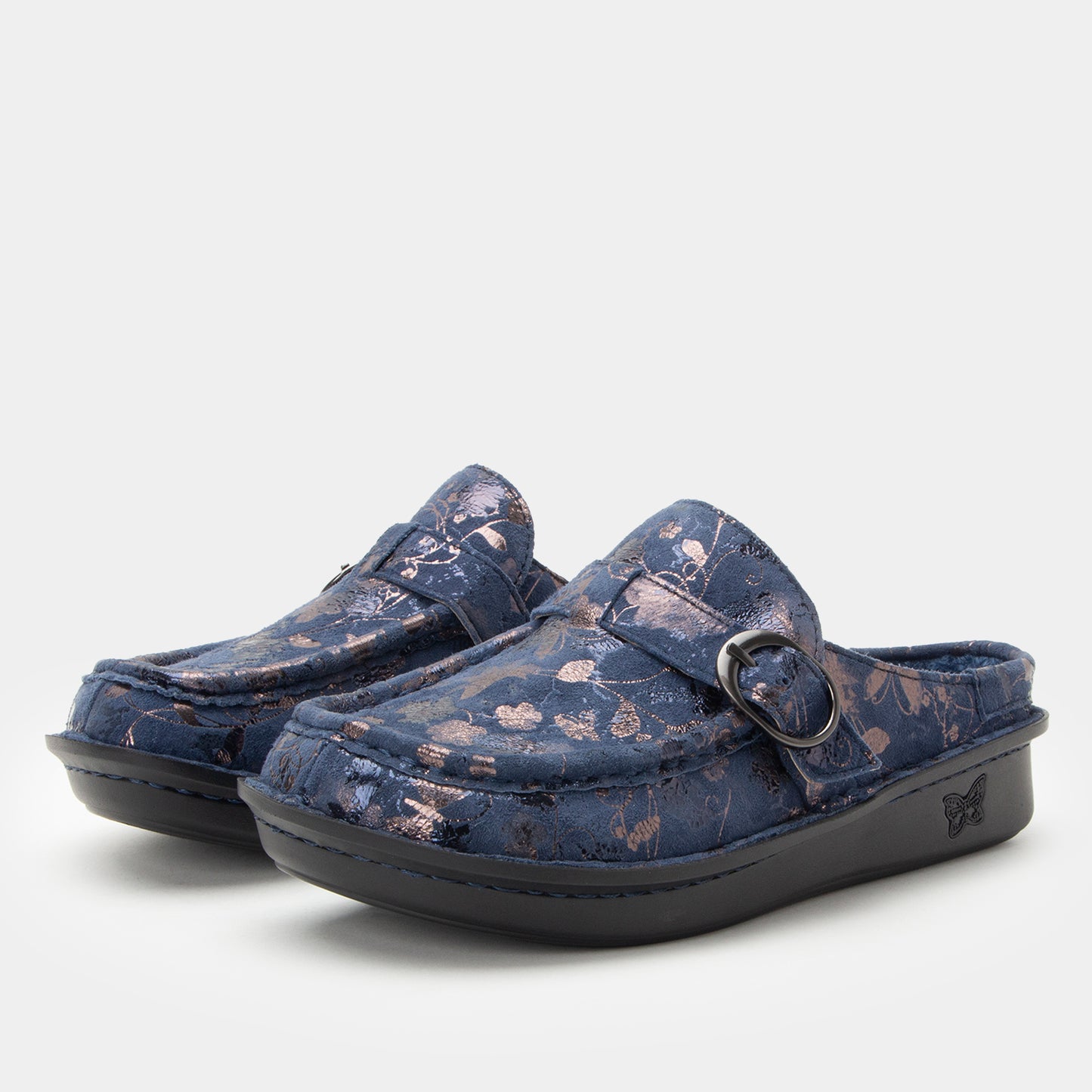Pair of blue floral-patterned clogs on a light gray background