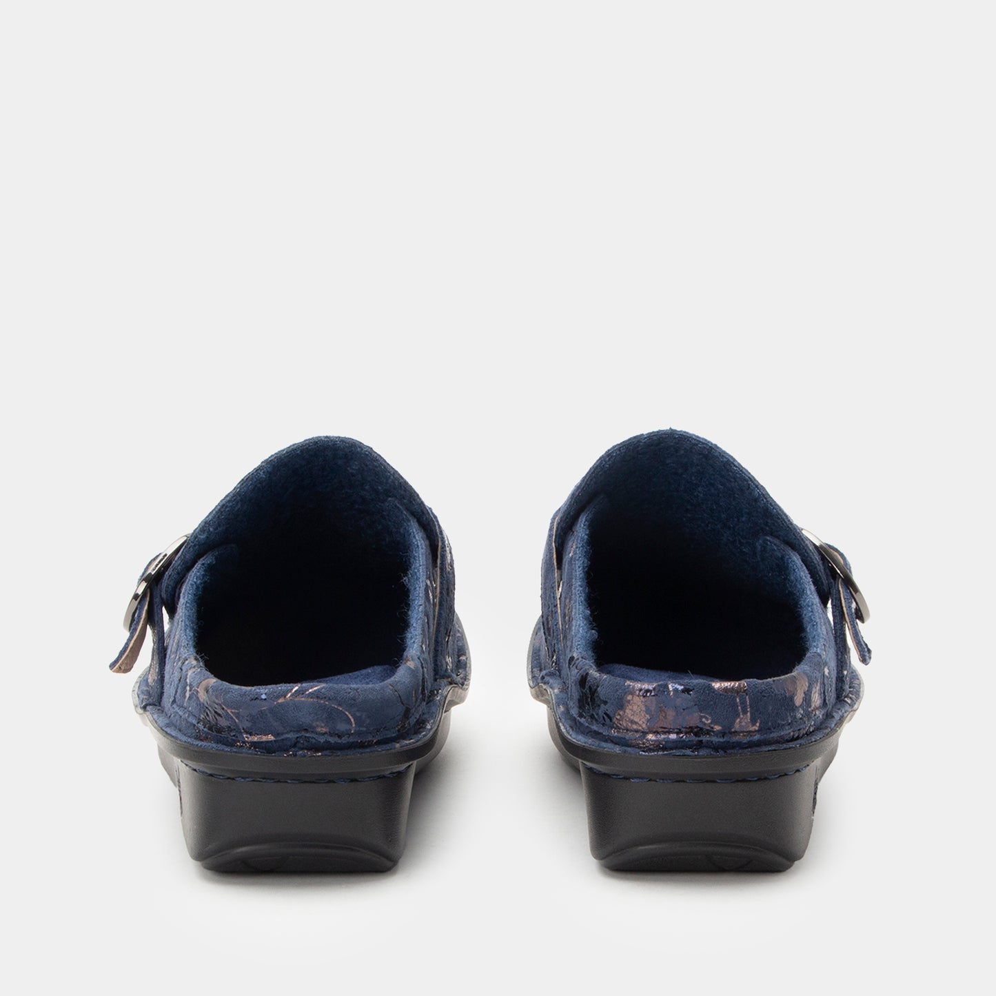 Pair of blue shoes with black soles on a white background
