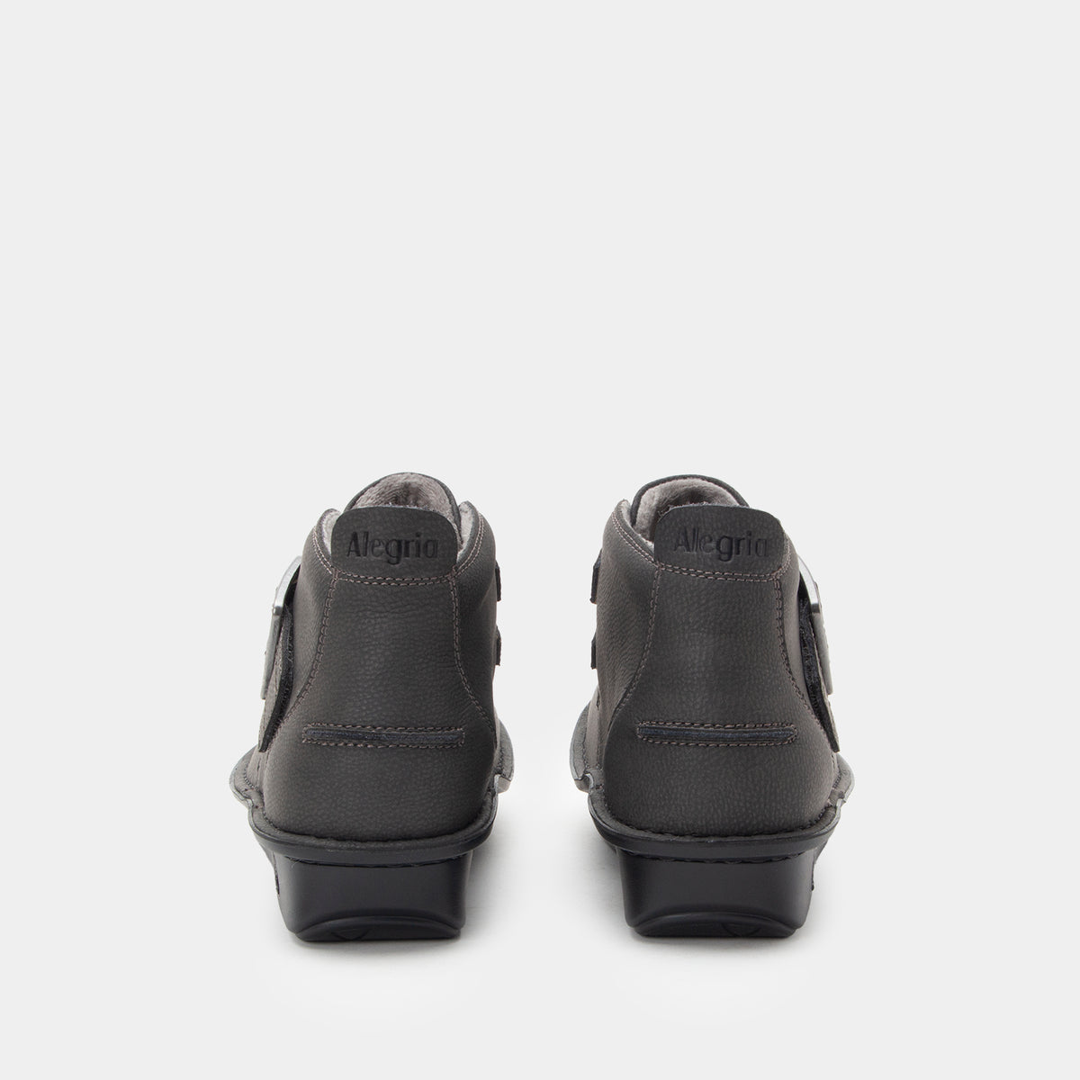 Pair of black shoes with 'Alegria' branding on a white background