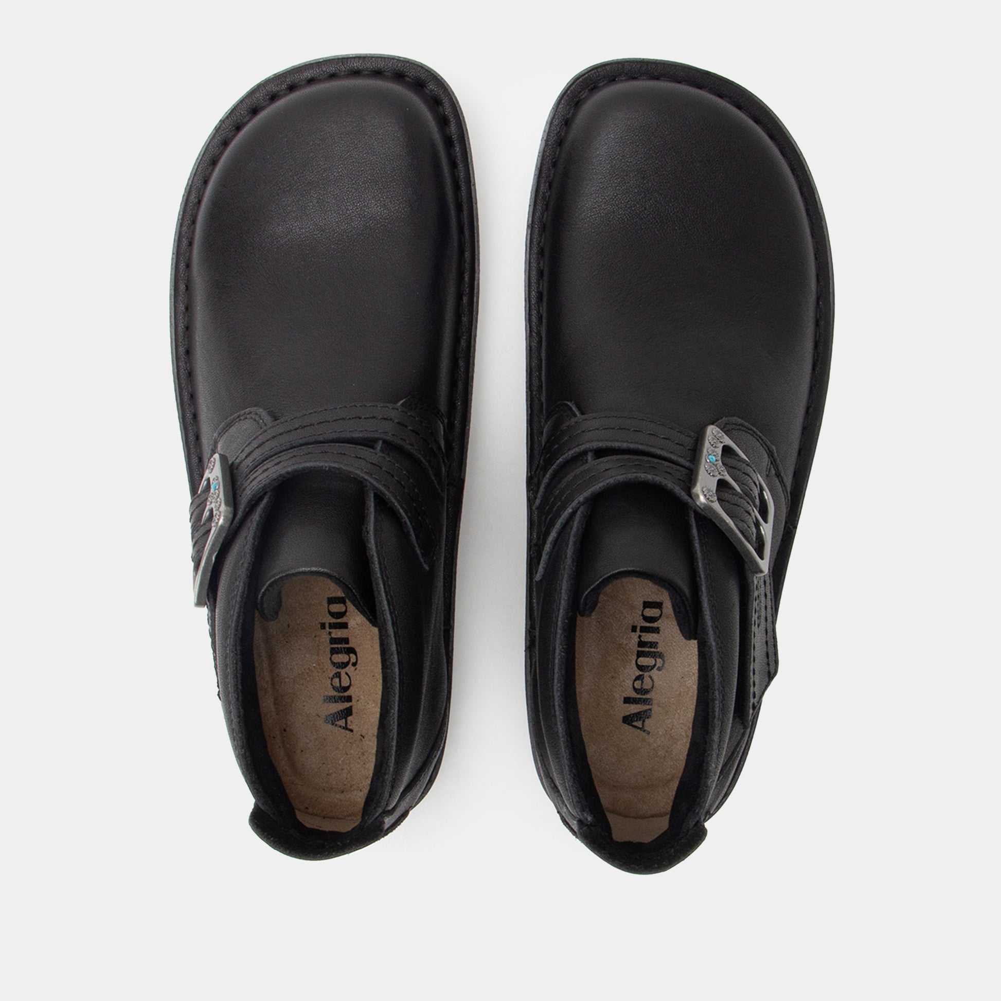 Pair of black Alegria shoes on a white background