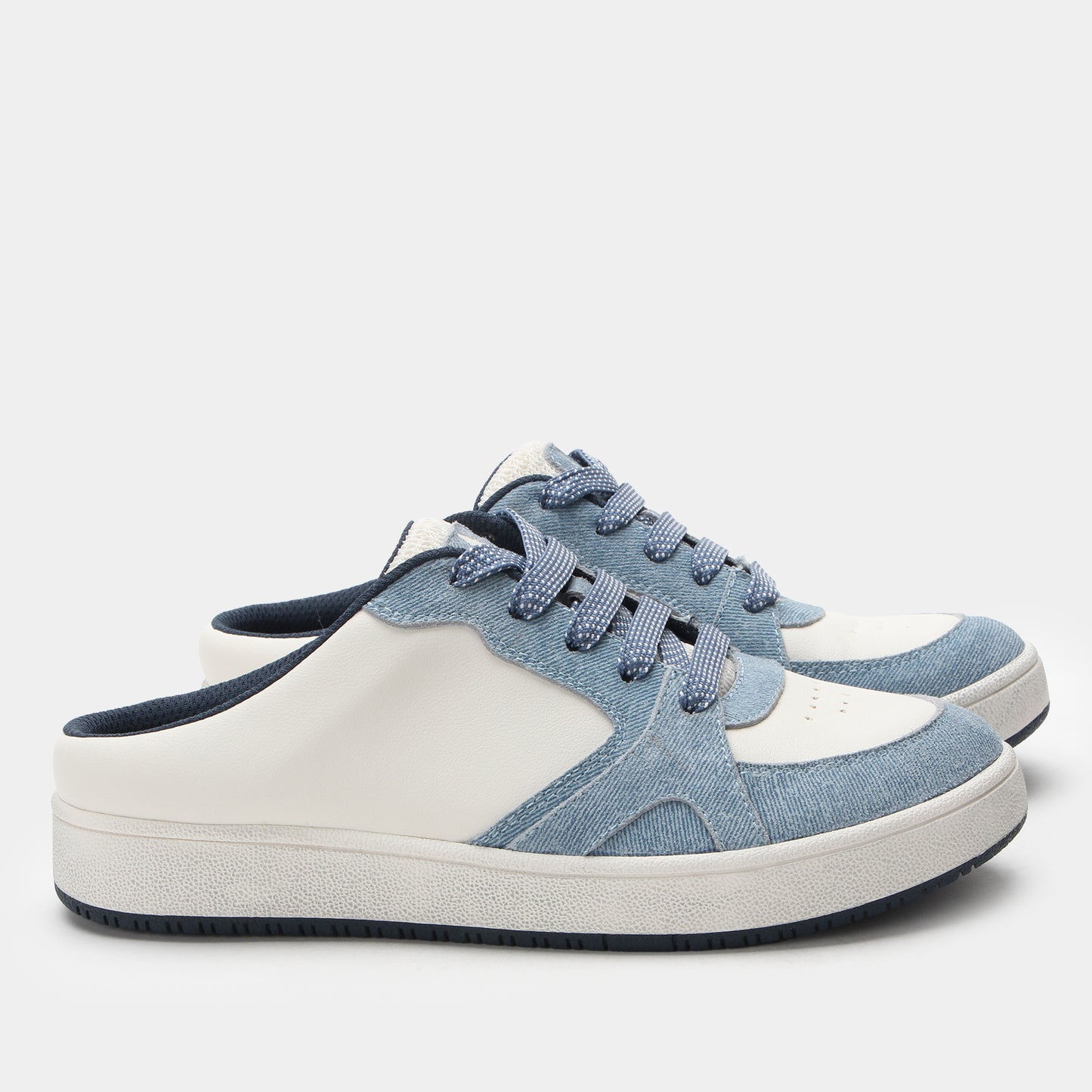 Blue and white sneakers on a light gray background