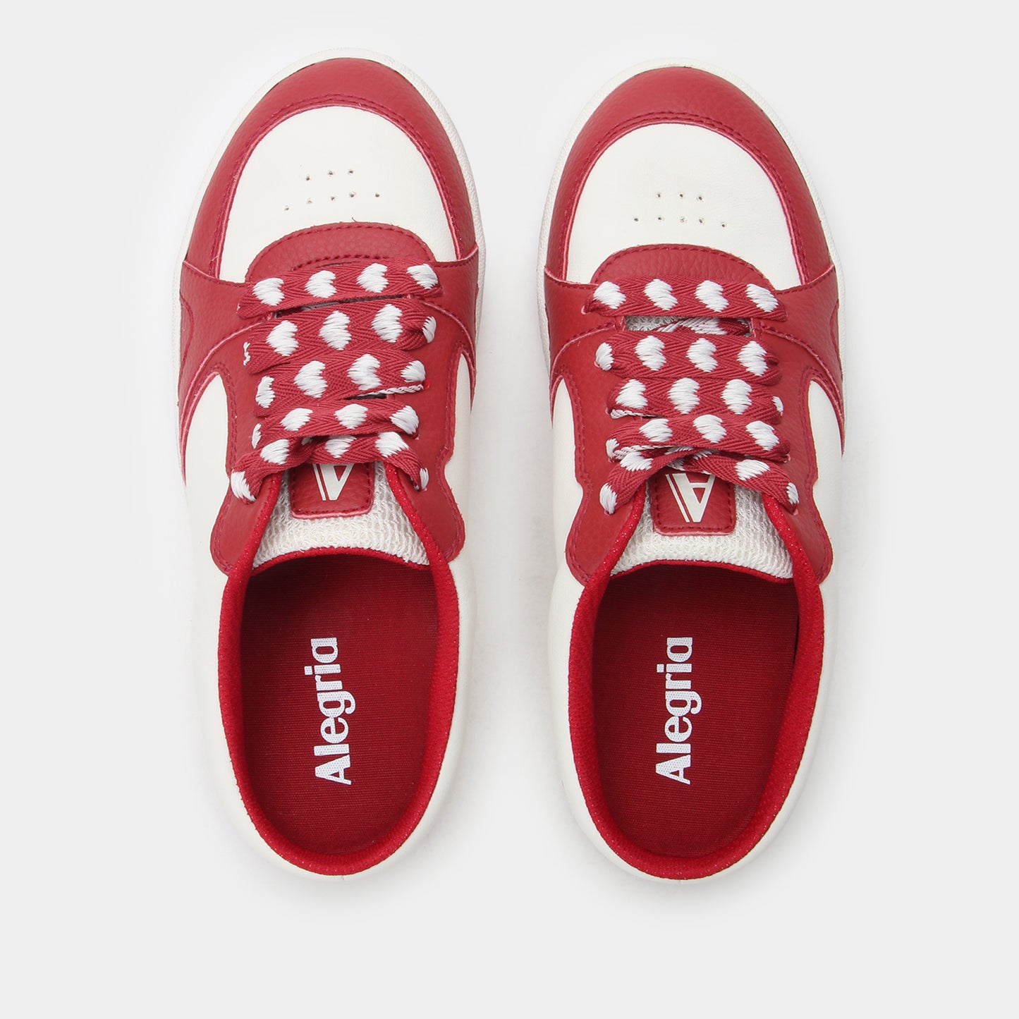 Red and white sneakers with 'Alegria' branding on a light gray background