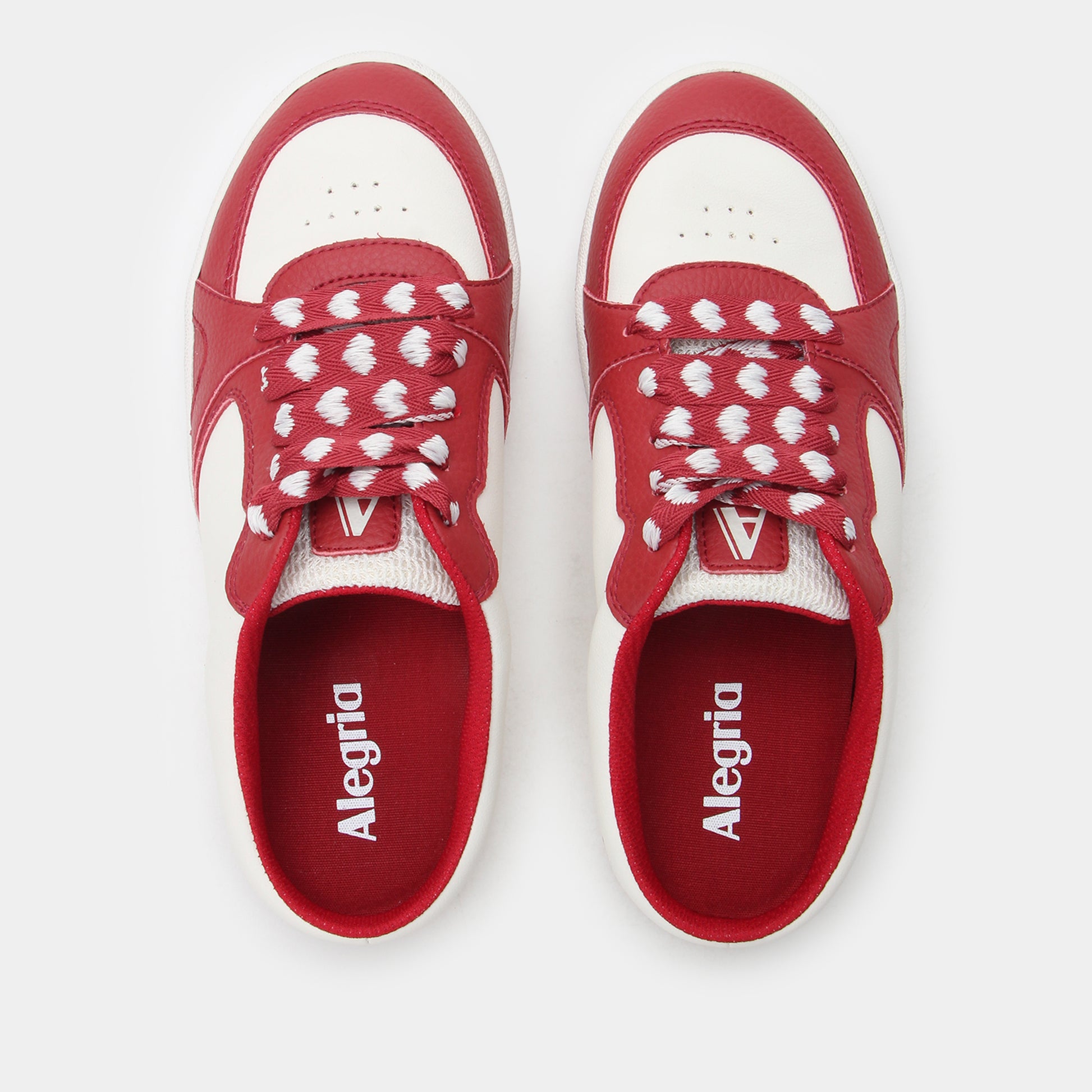 Red and white sneakers with 'Alegria' branding on a light gray background