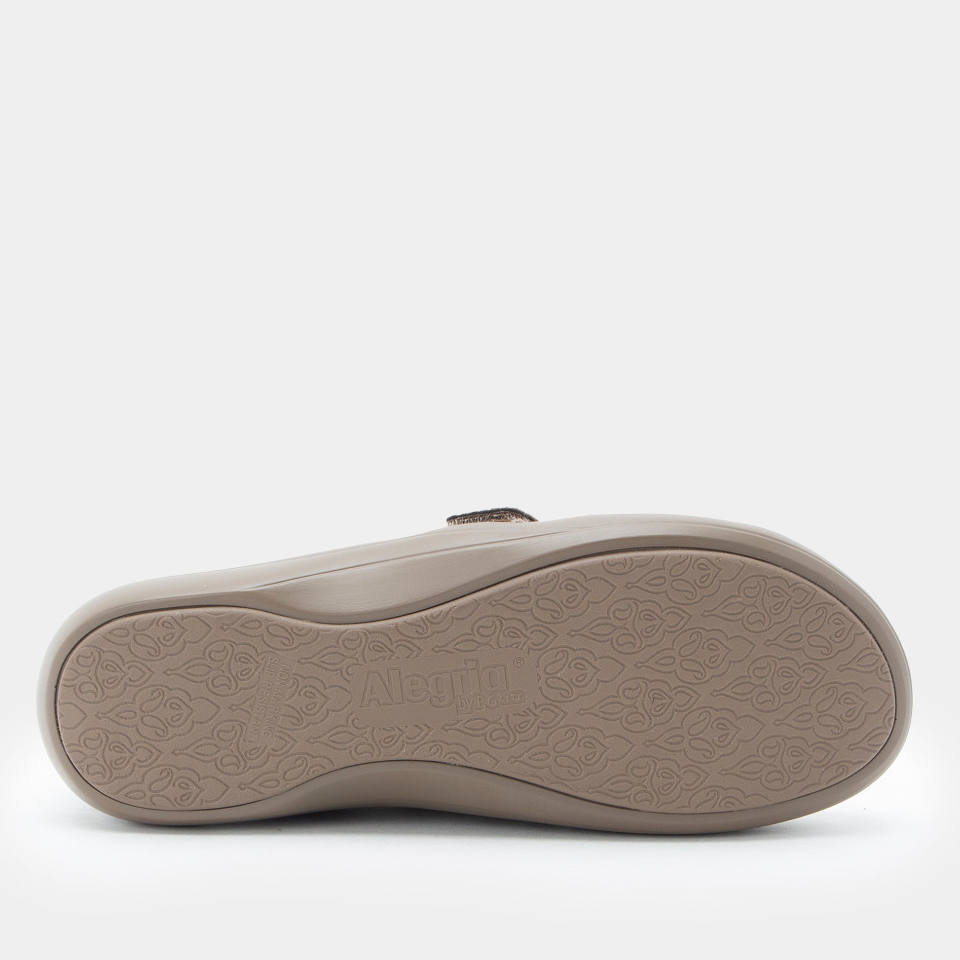 A single taupe-colored shoe shown from a bottom view, displaying its textured rubber sole with the brand name 'Alegria' embossed in the center.