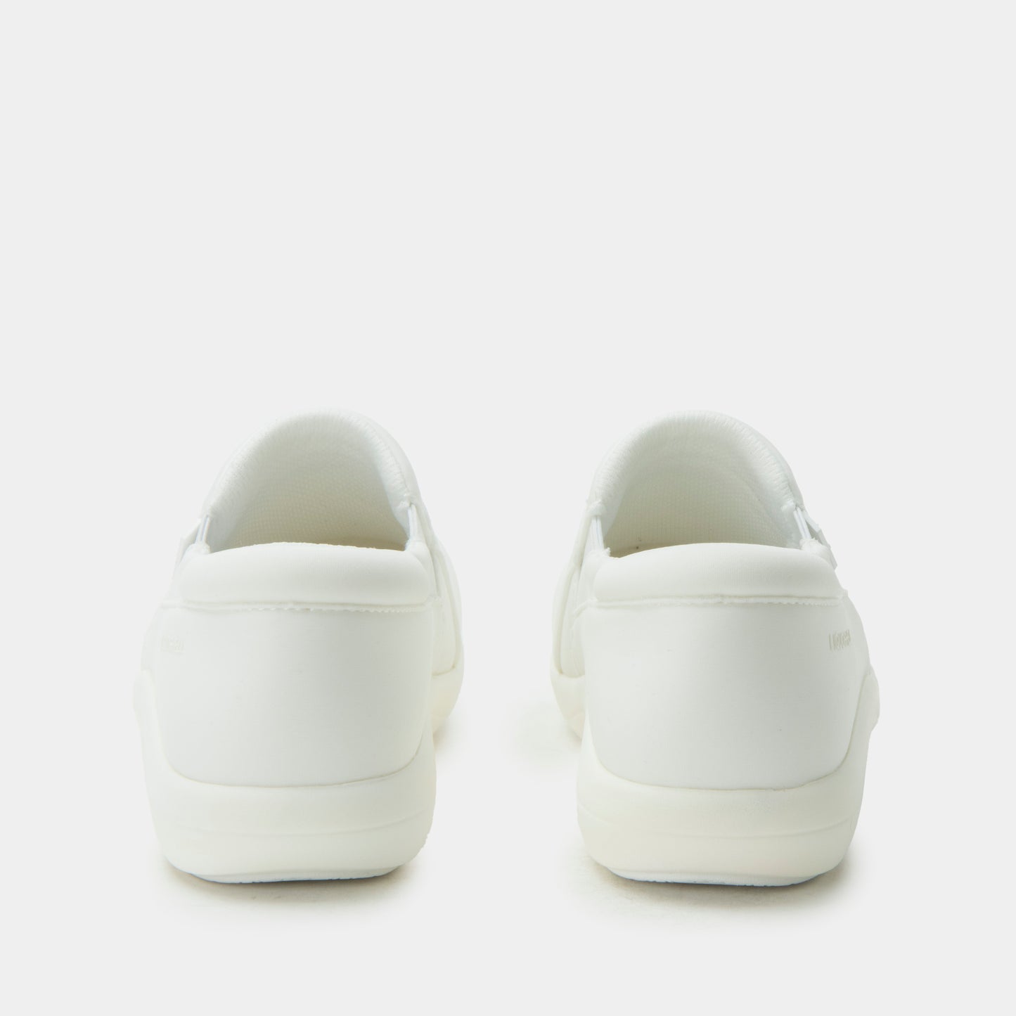 White sneakers on a light gray background
