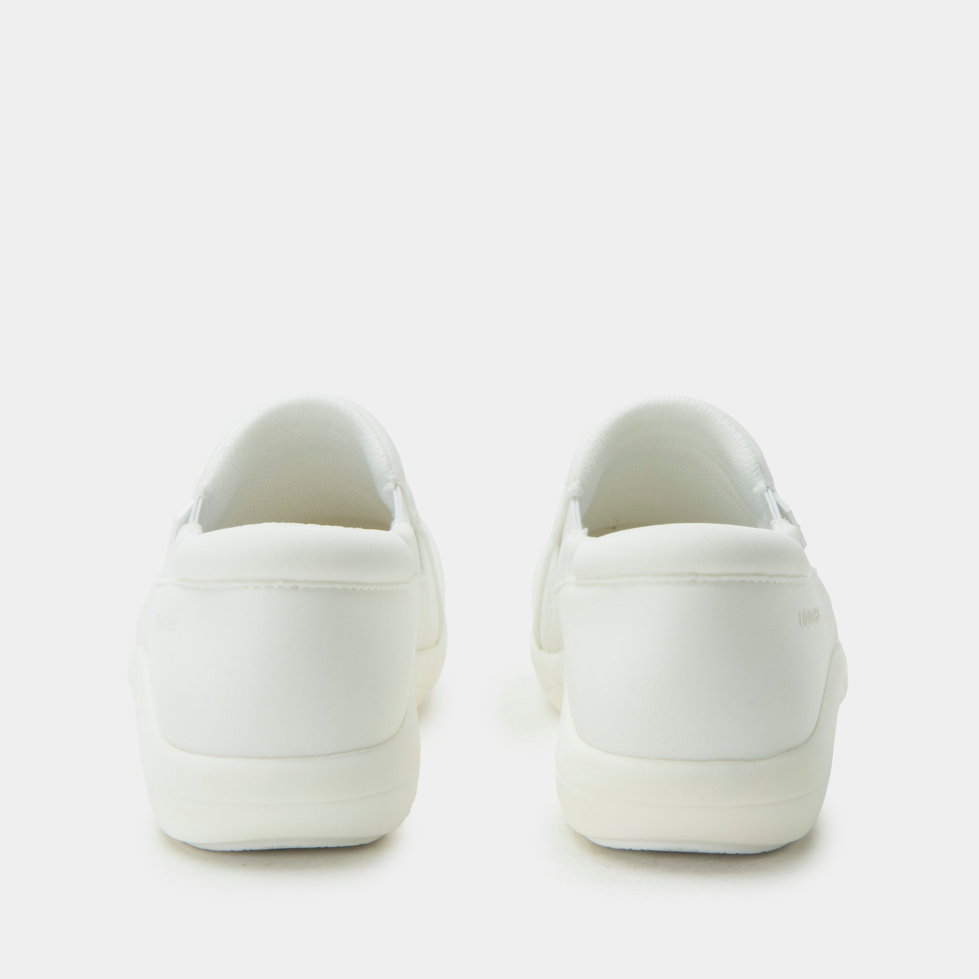 White sneakers on a light gray background