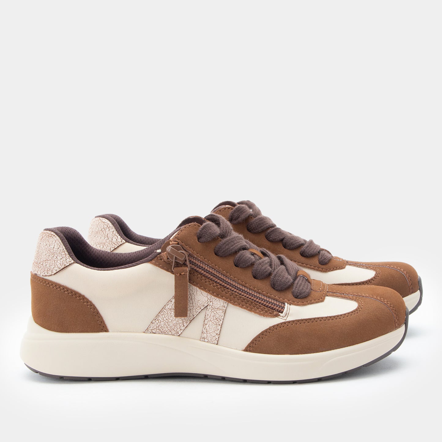 Brown and white sneakers on a white background