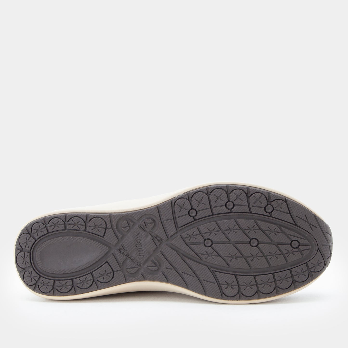 Shoe sole with tread pattern on a white background