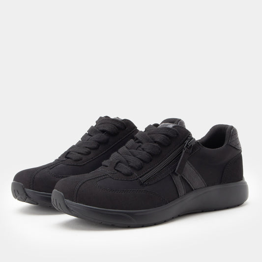 Black sneakers with a zipper on a white background