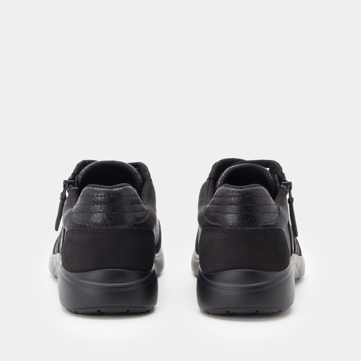 Black sneakers on a white background