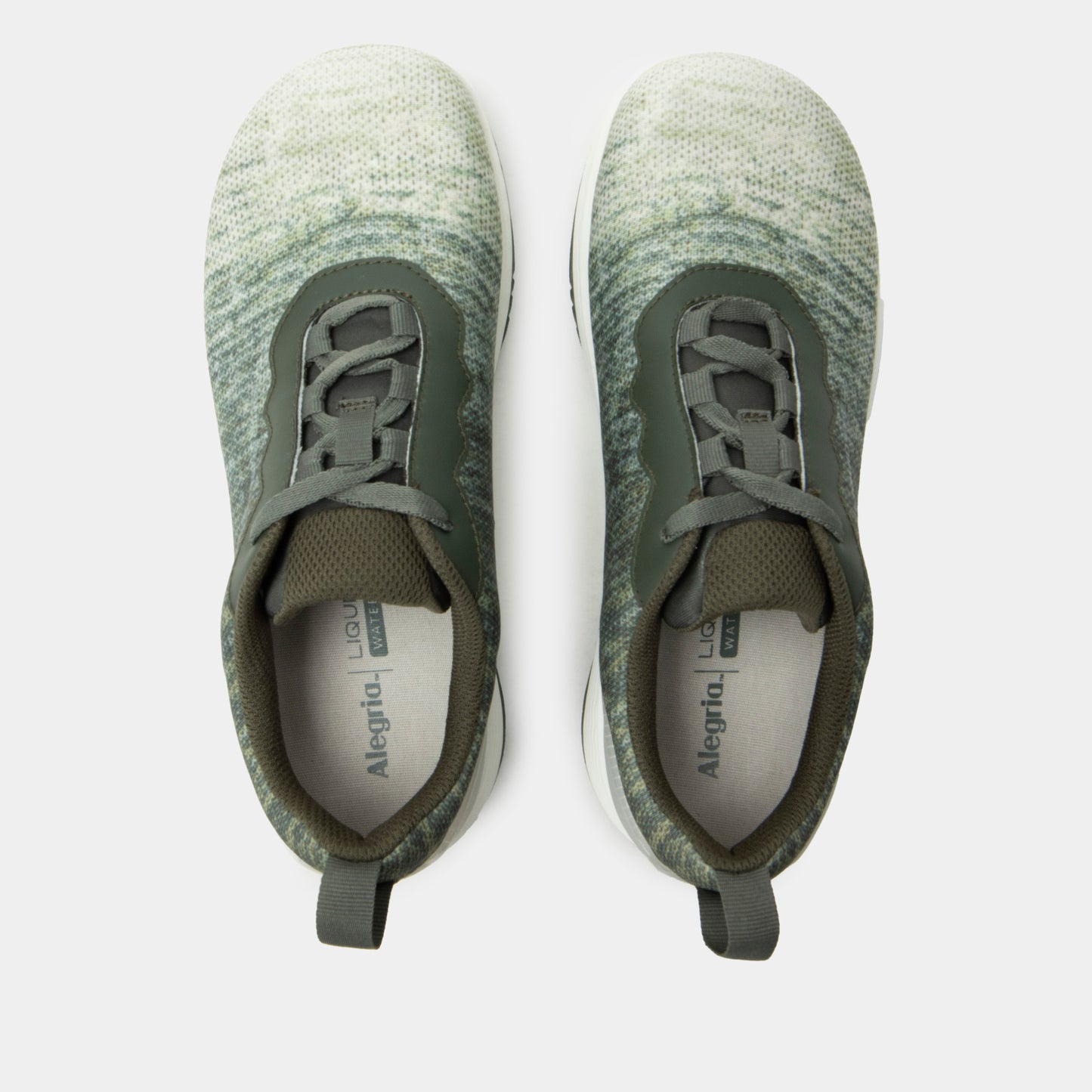Pair of green sneakers with a textured knit upper on a white background