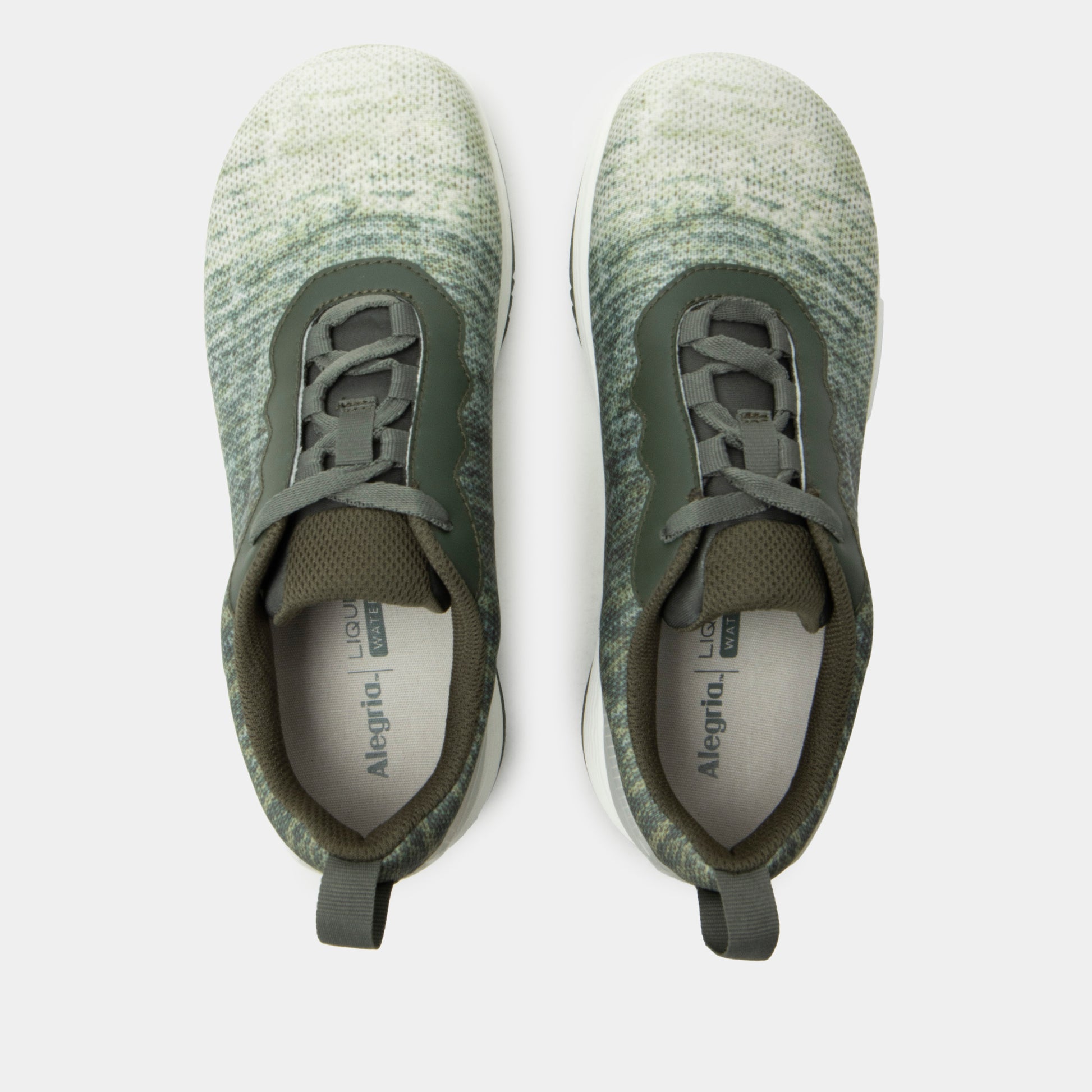 Pair of green sneakers with a textured knit upper on a white background
