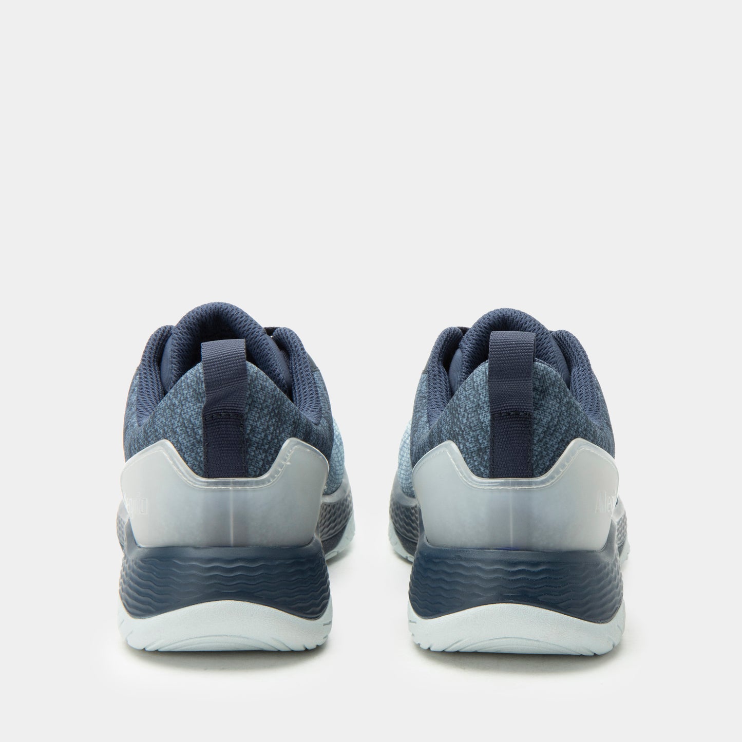 Pair of blue athletic shoes on a light gray background