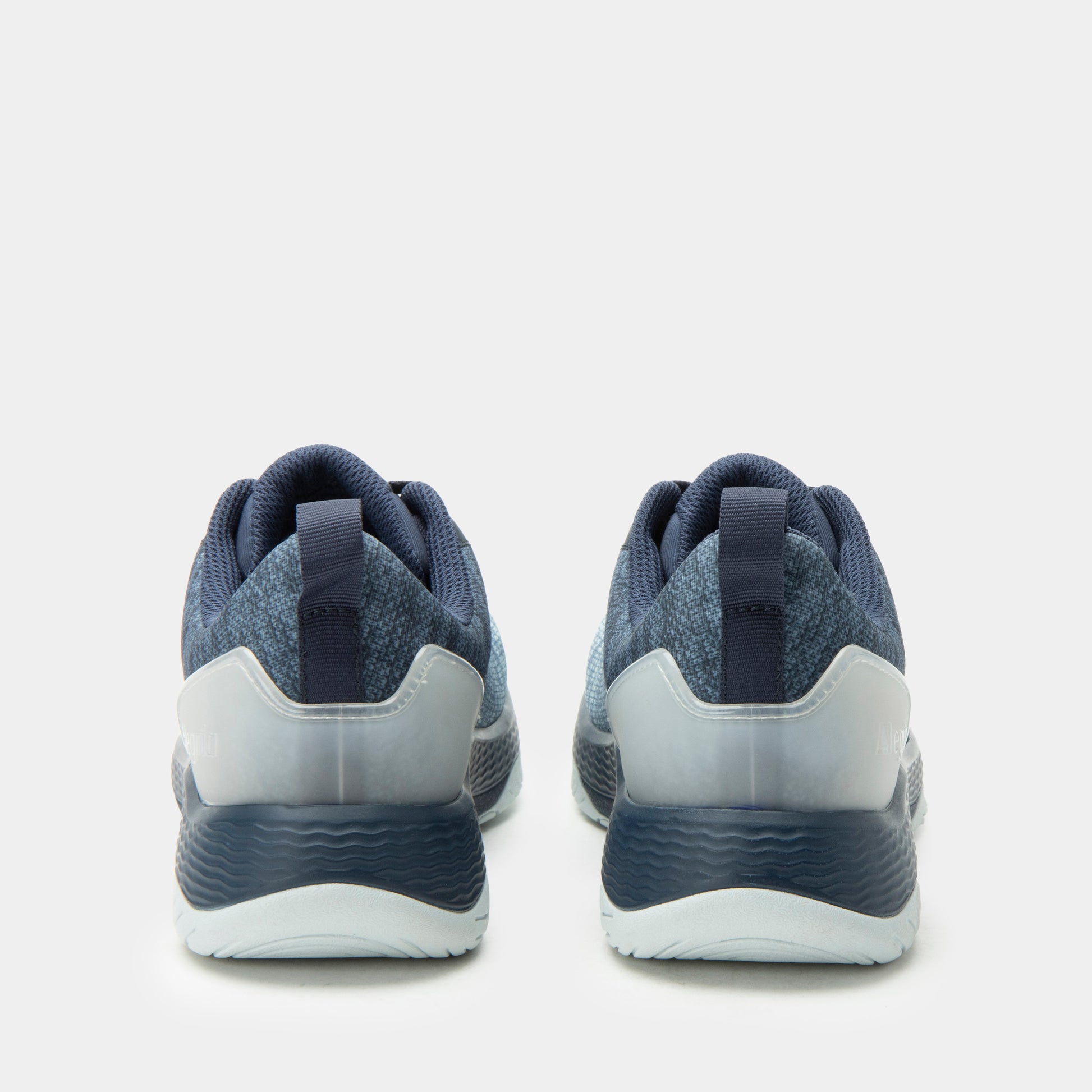 Pair of blue athletic shoes on a light gray background