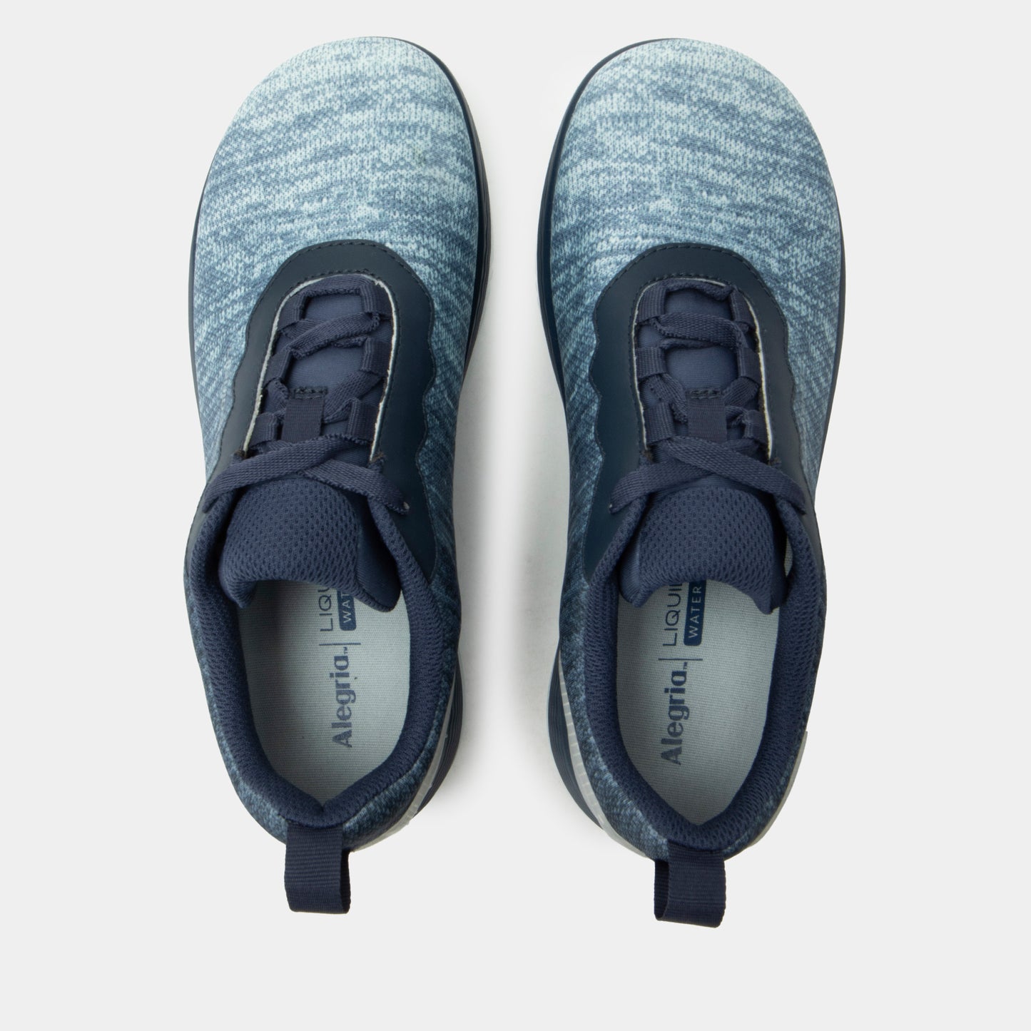 Pair of blue athletic shoes on a light gray background