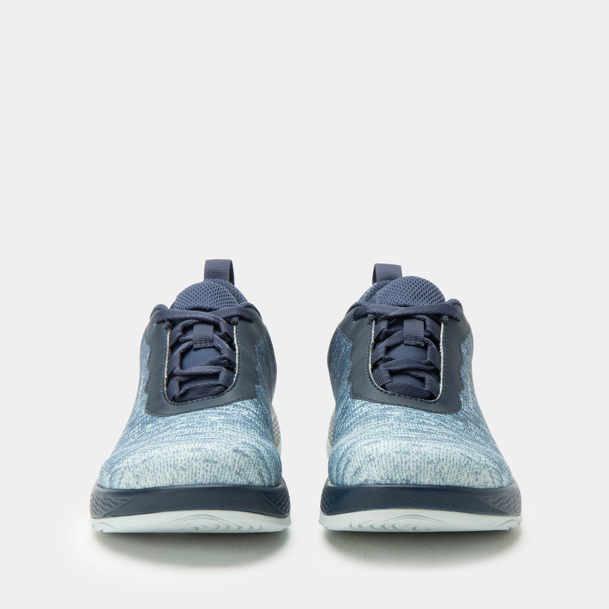 Pair of blue athletic shoes on a white background