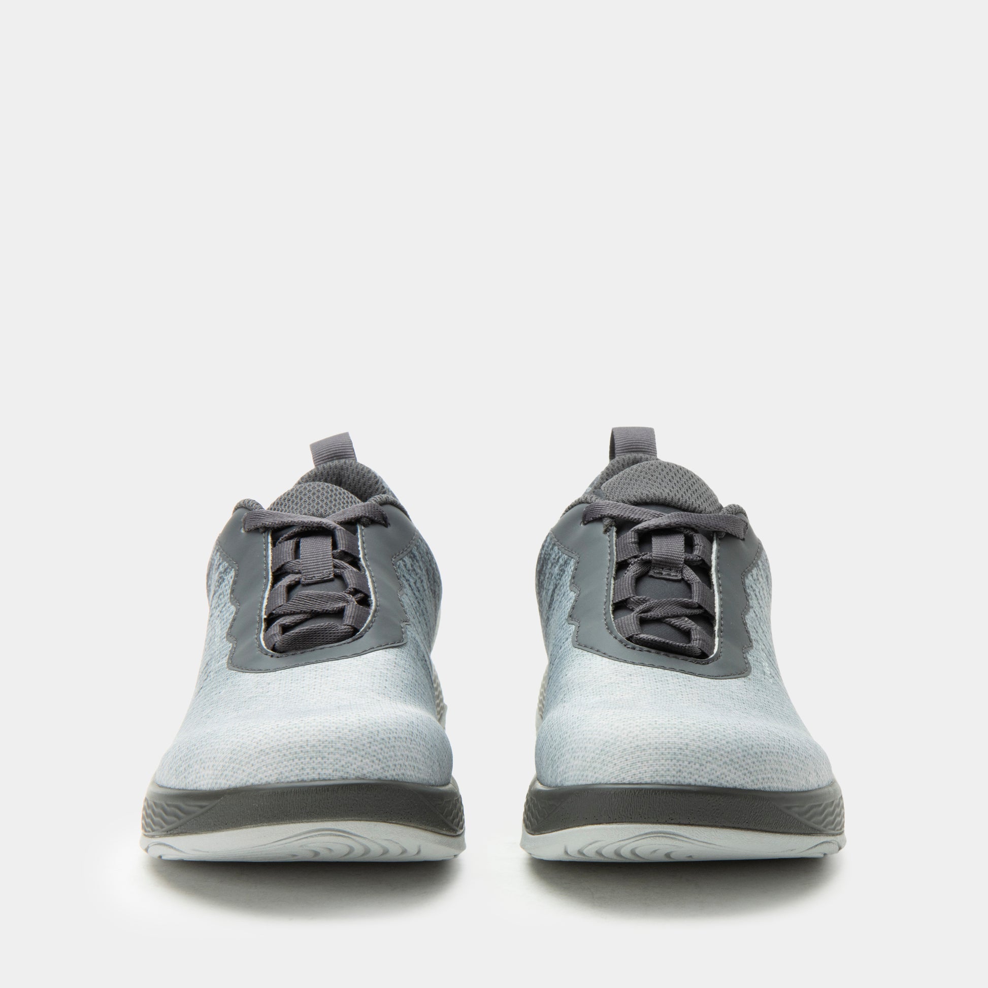 Gray athletic shoes on a white background