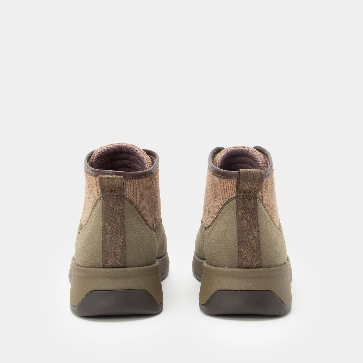 A pair of mid-height zip-up boots shown from the back, featuring olive green and brown textured panels with a dark gray sole, set against a plain light gray background.