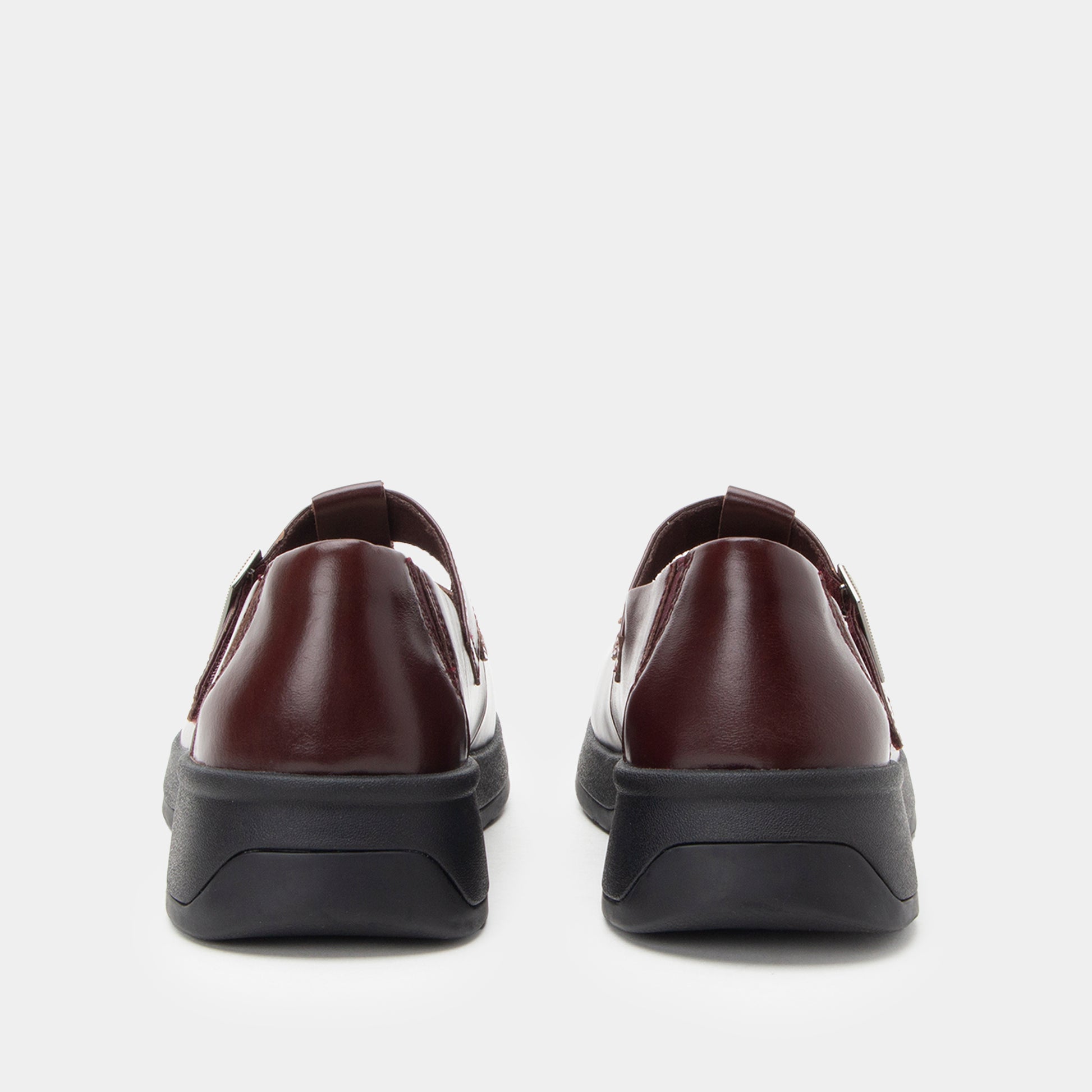 Pair of brown leather shoes on a white background