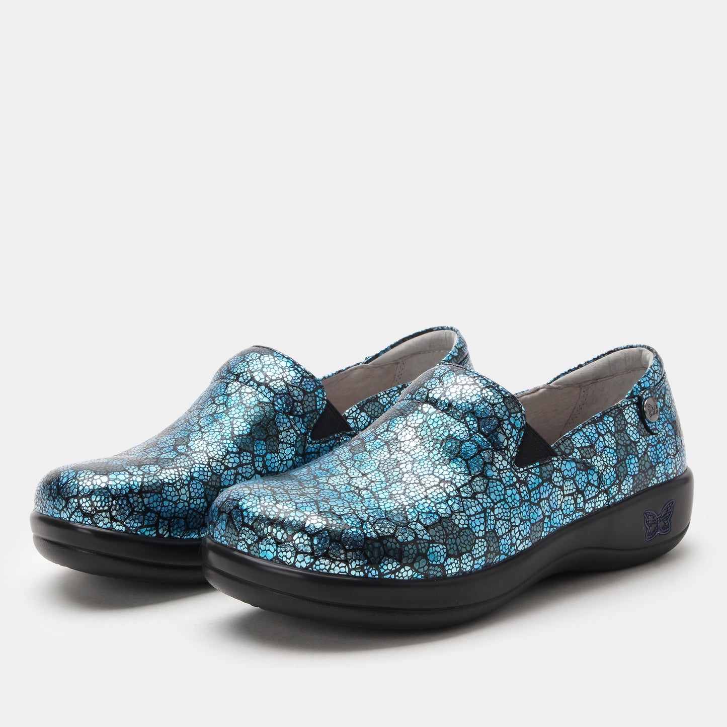 Pair of blue patterned shoes on a white background