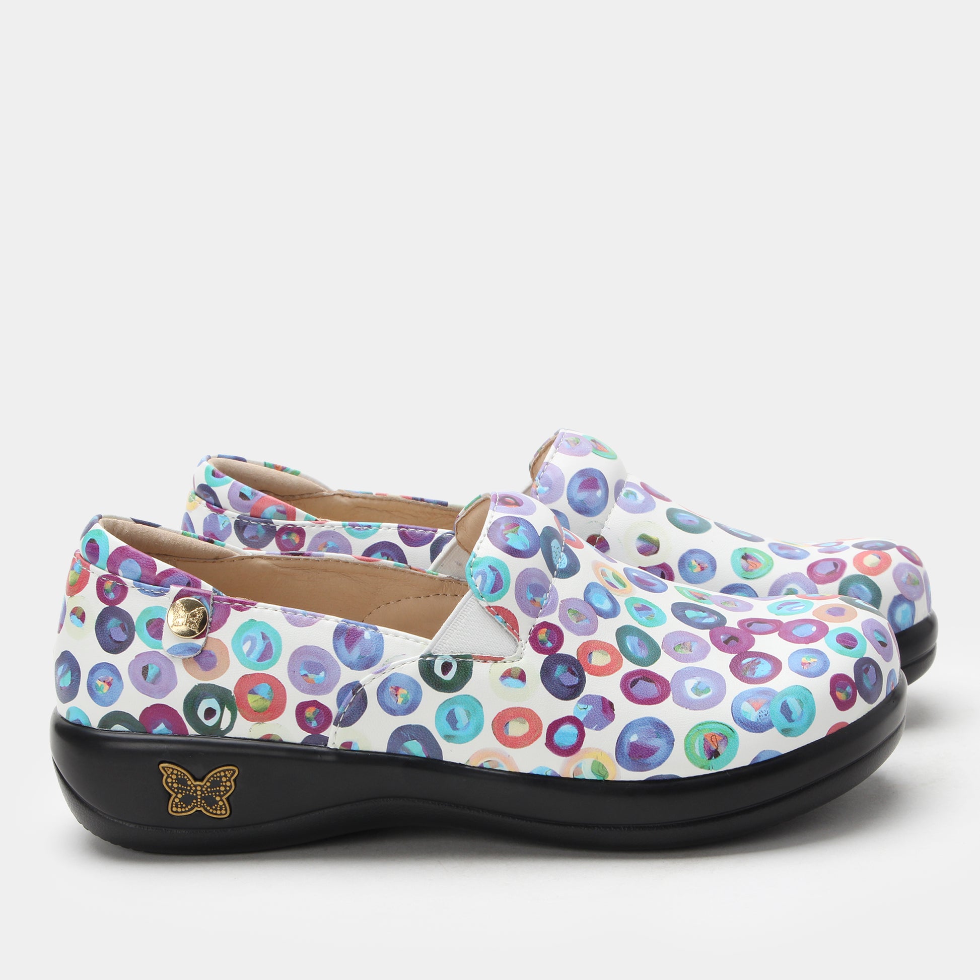 Pair of colorful patterned shoes on a white background