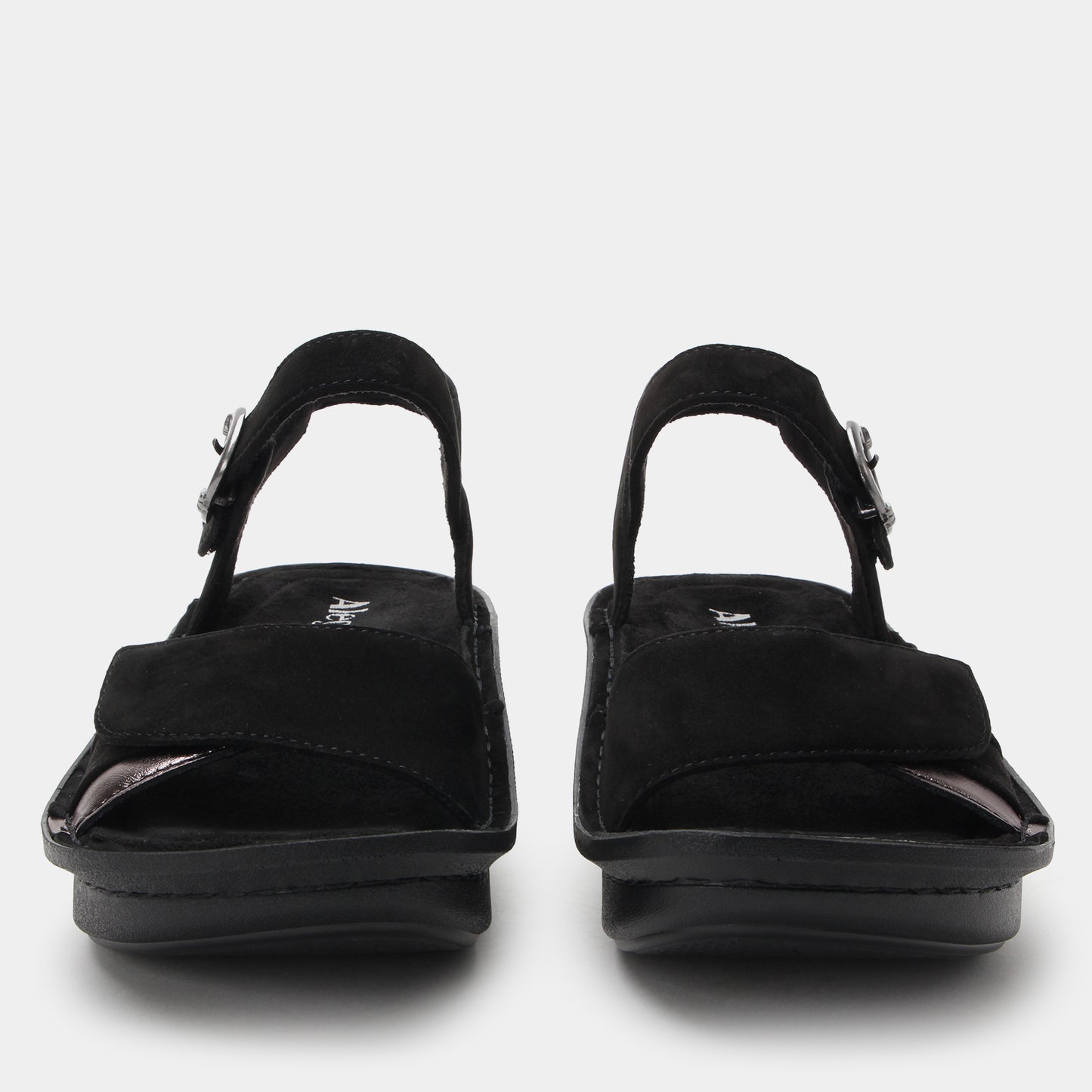 Black sandals with a strap on a white background