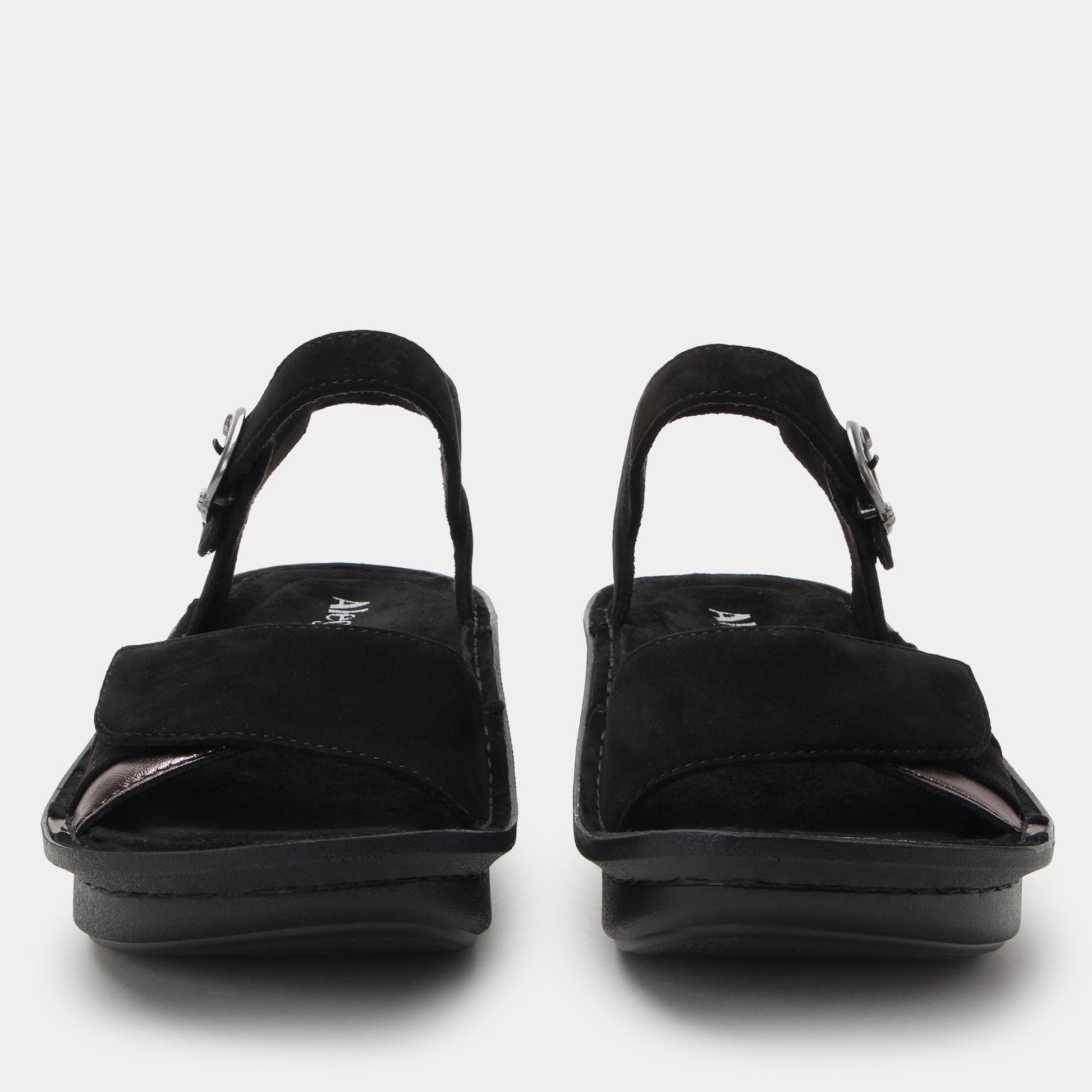 Black sandals with a strap on a white background