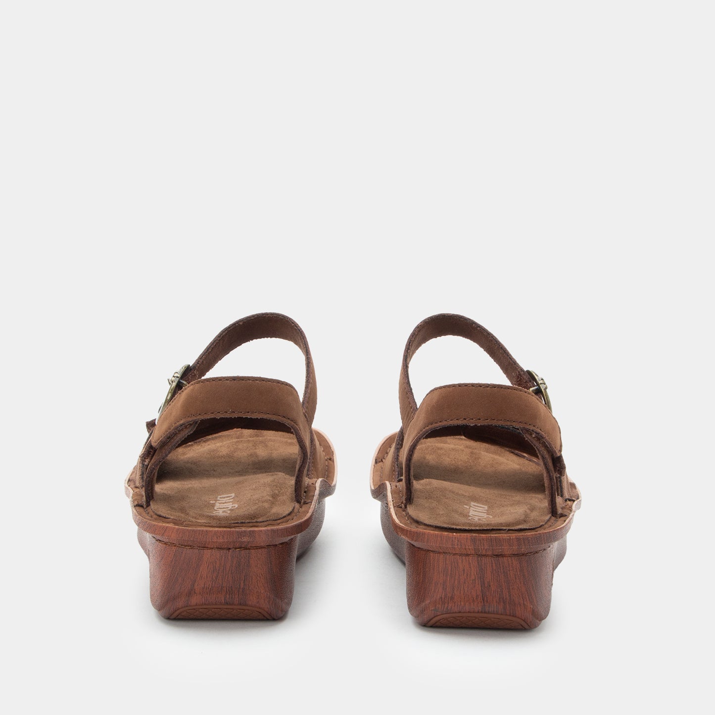 Pair of brown sandals on a white background